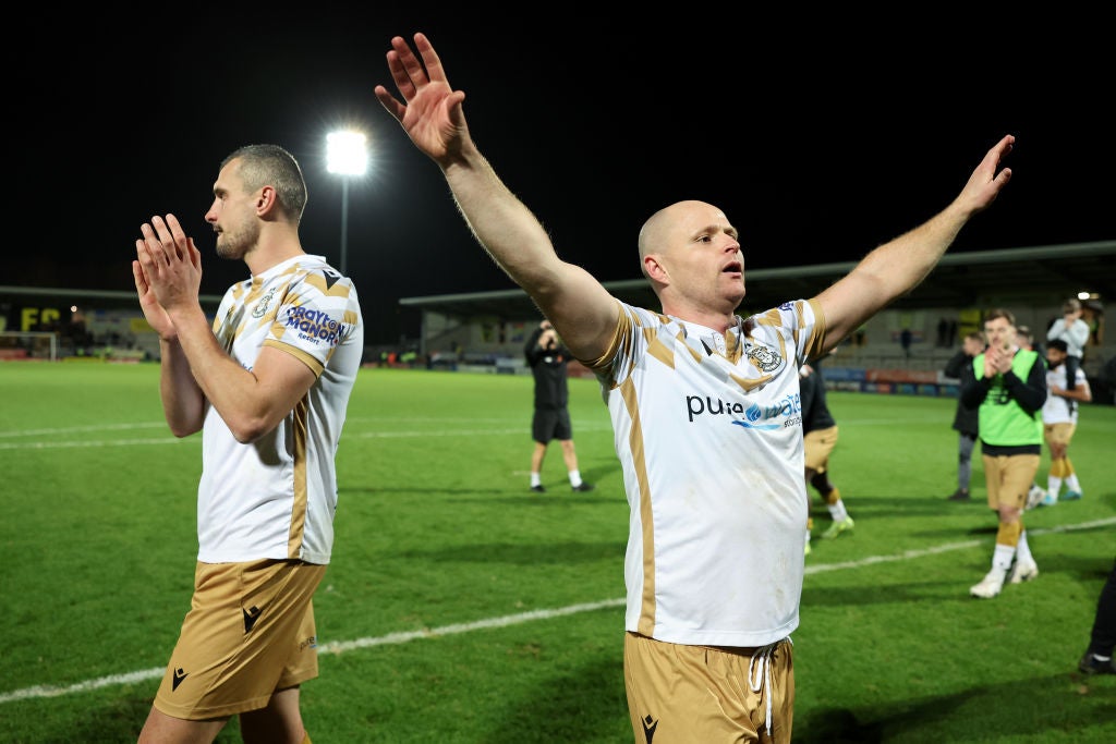 Tom Tonks celebrates Tamworth reaching the FA Cup third round