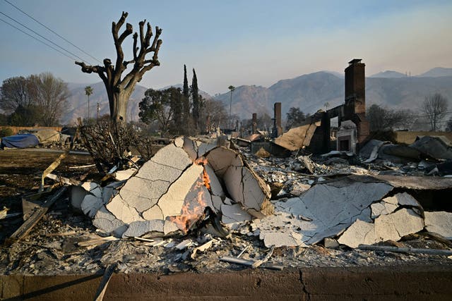 <p>A home reduced to rubble by the Eaton Fire in Altadena, California. Home insurers cannot drop fire victims from their policies for the next year, according to a new state policy </p>