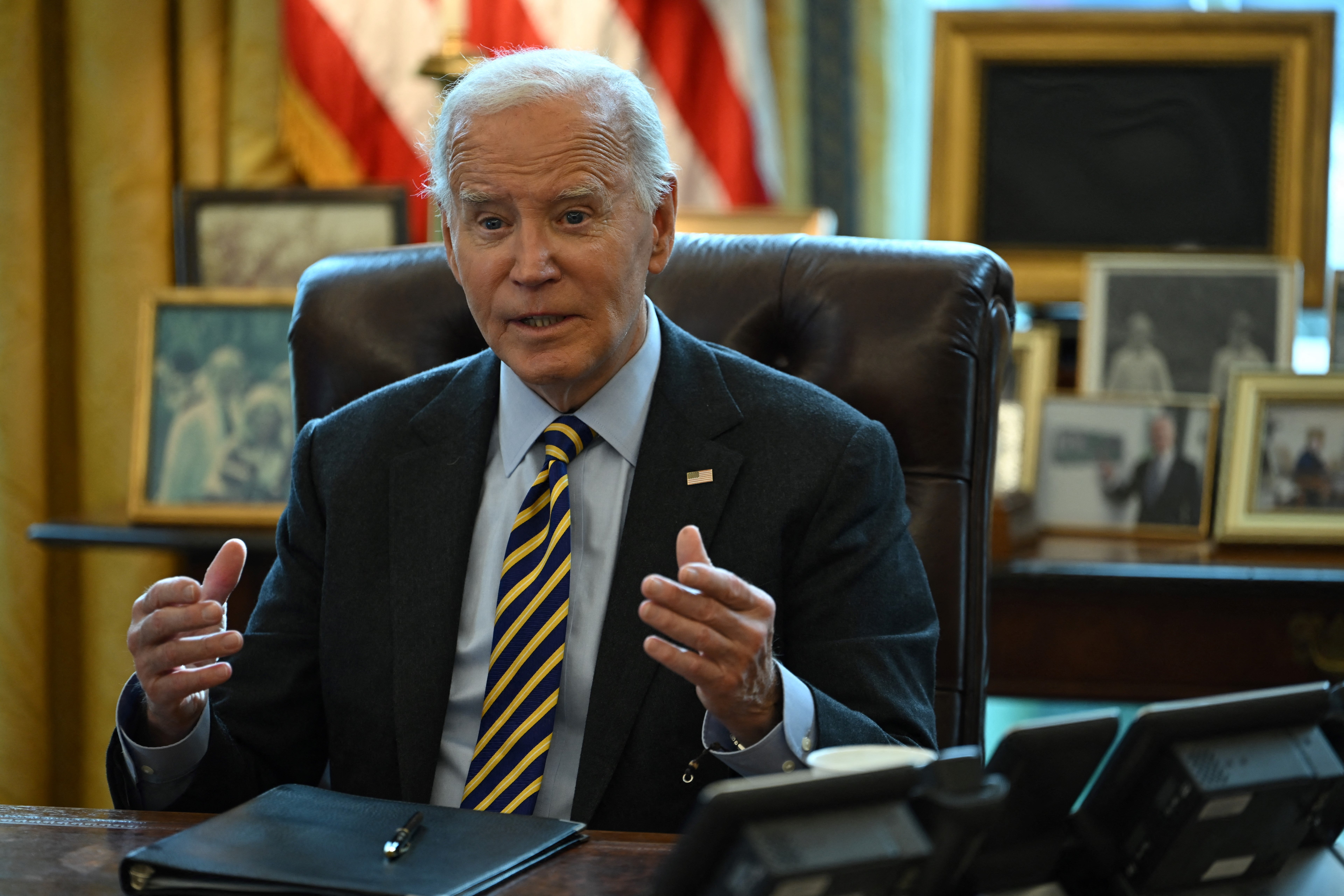 President Joe Biden speaks during a Friday briefing on federal response to the Los Angeles wildfires in the Oval Office of the White House in Washington, D.C. Biden assured that the administration would ‘be around’ for impacted communities