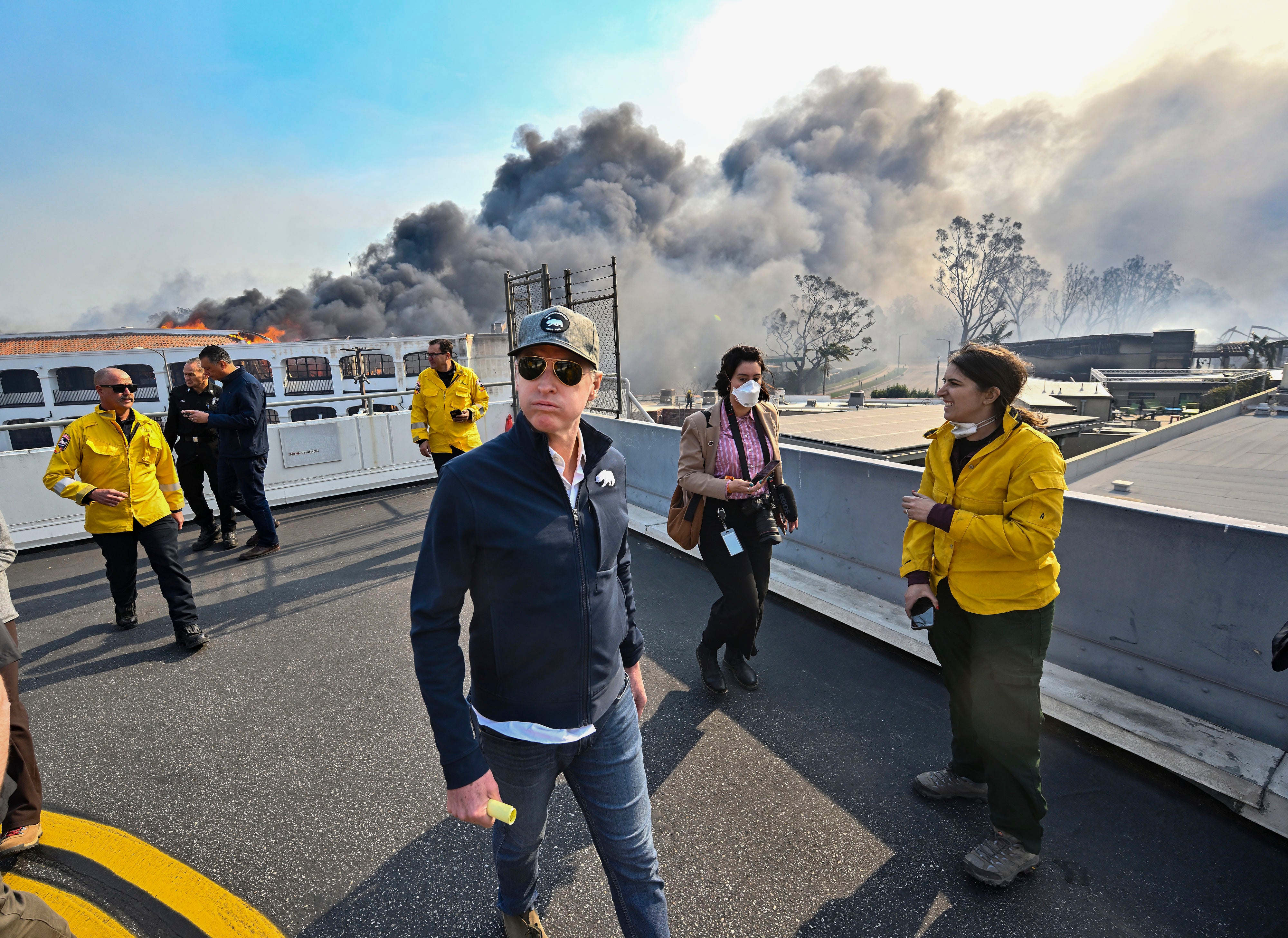 California Governor Gavin Newsom surveys damage in during the Palisades Fire