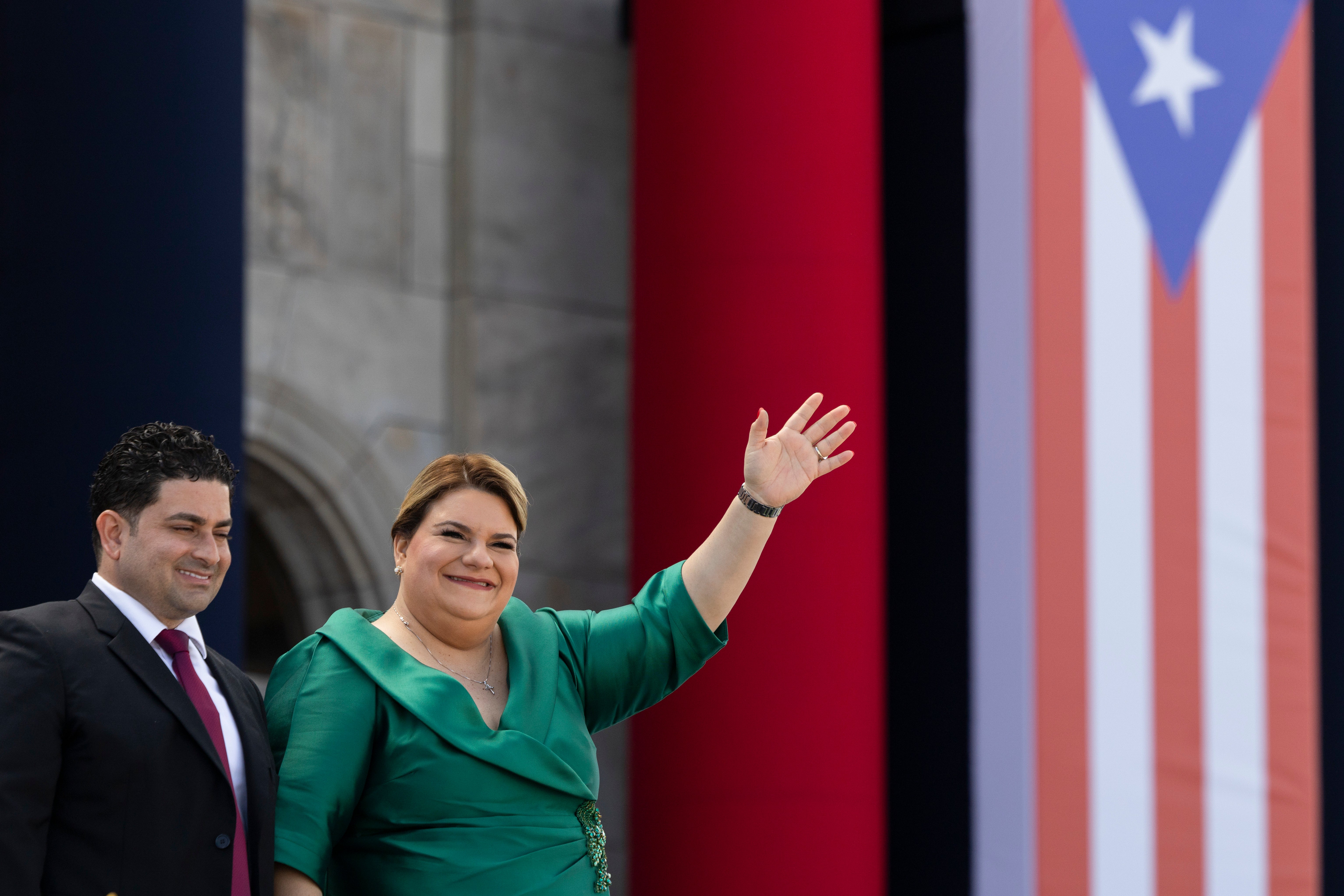 Jenniffer González-Colón waves as she’s sworn in as Puerto Rico’s governor. She has called Maduro’s speech an open threat to the US