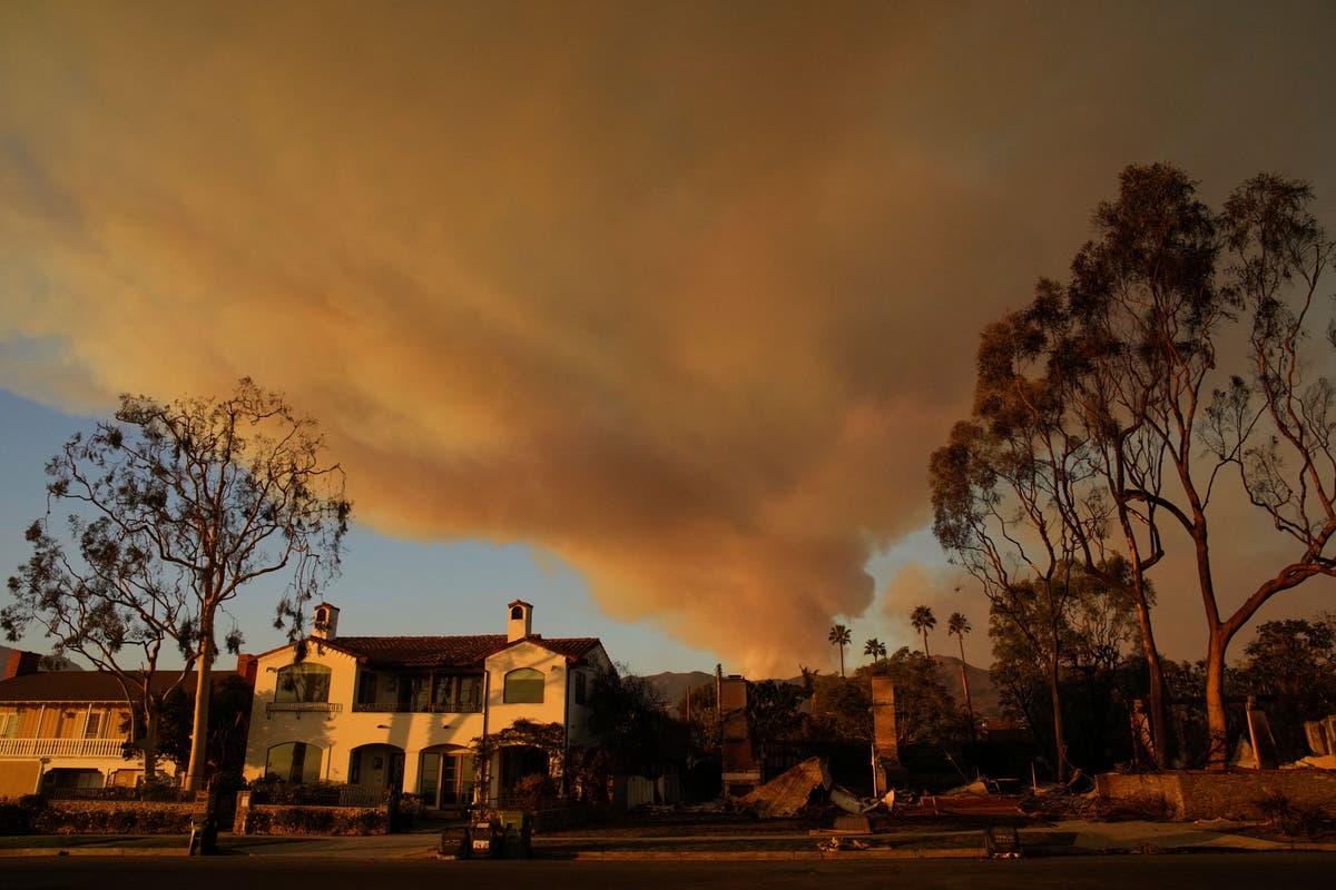 With their Los Angeles-area homes still smoldering, families return to search the ruins for memories