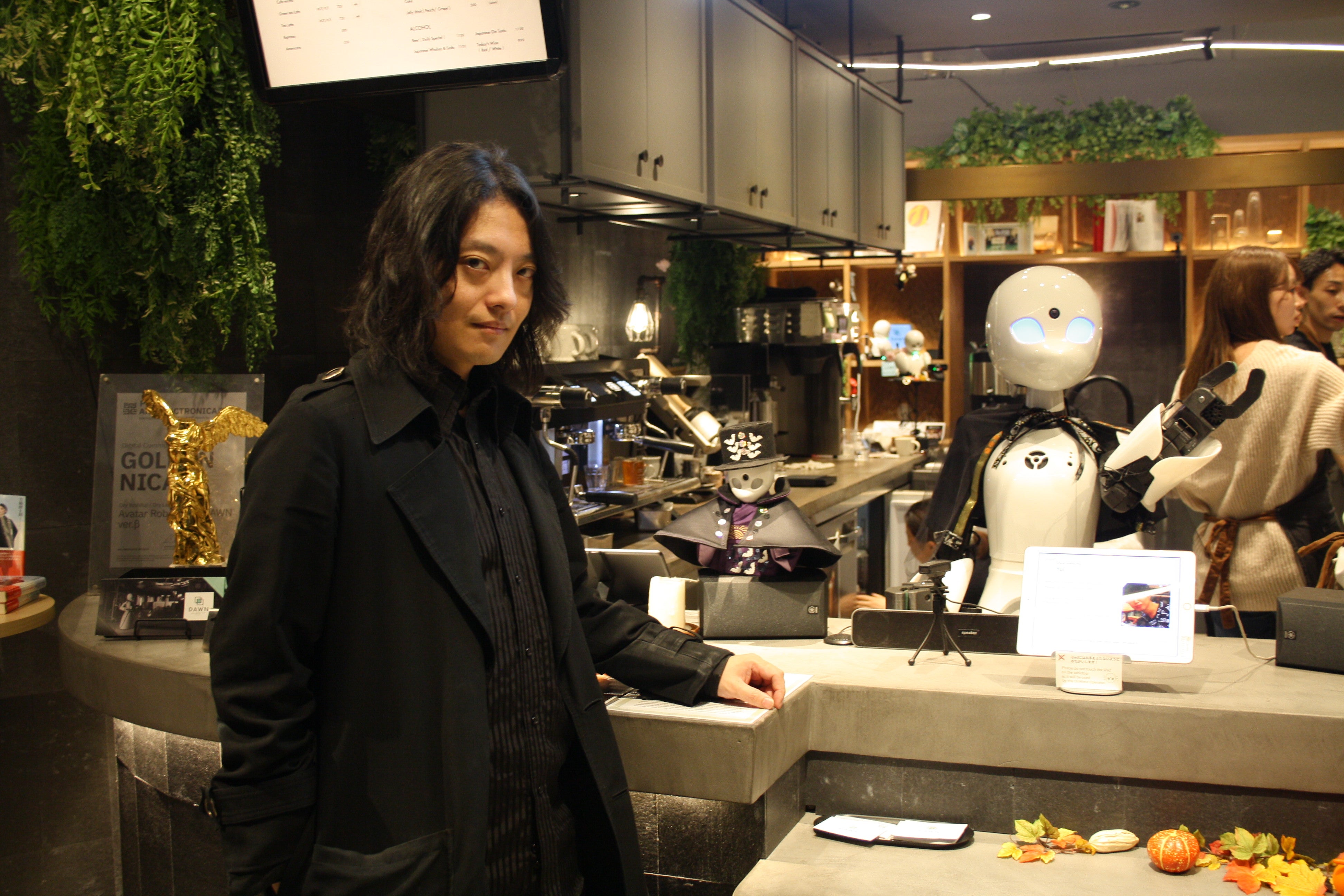 Kentaro Yoshifuji (pictured) says his robots provide a kind of transportation for people who would otherwise not leave their homes