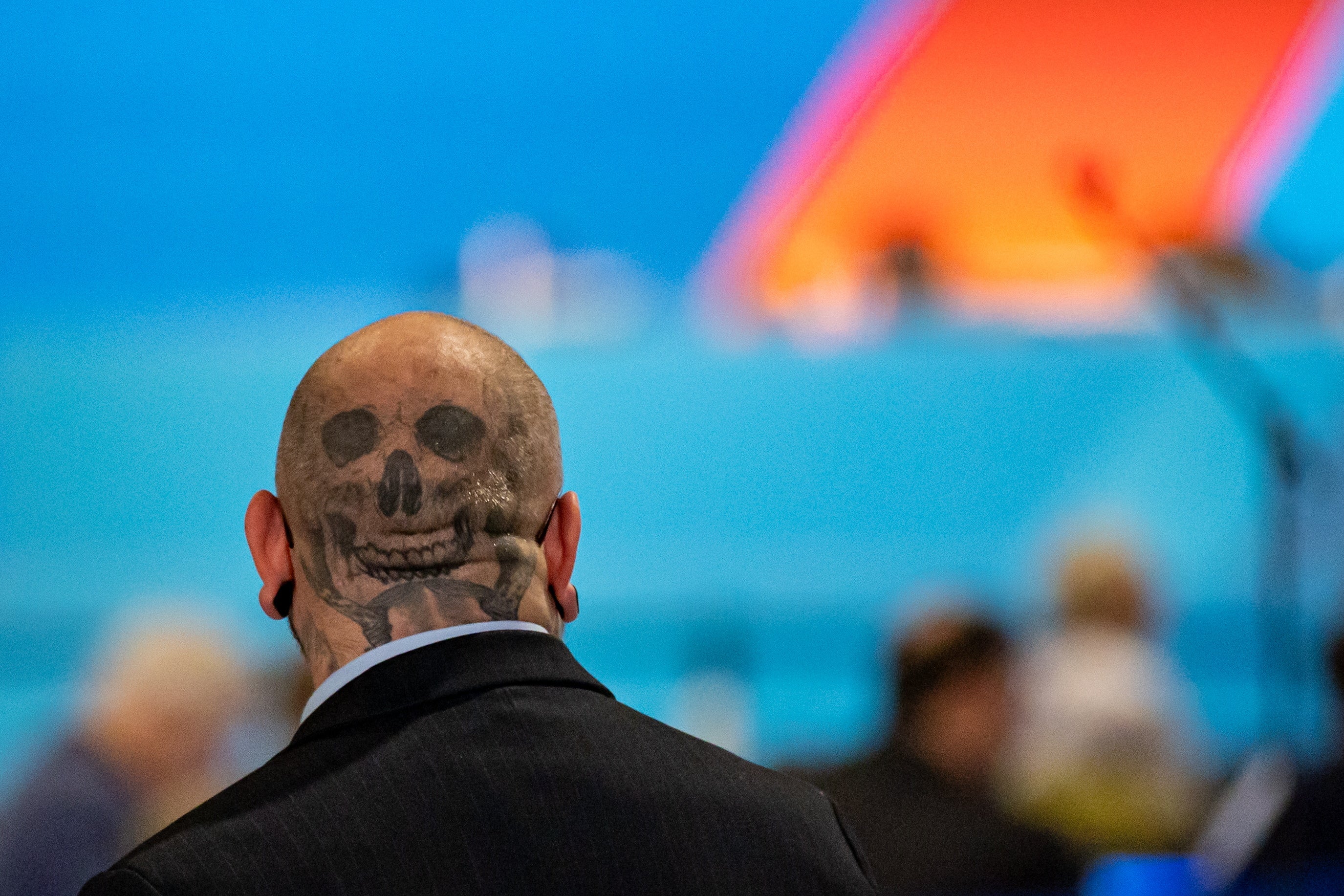 A delegate waits for the start of the AfD conference in Riesa, Germany on Saturday