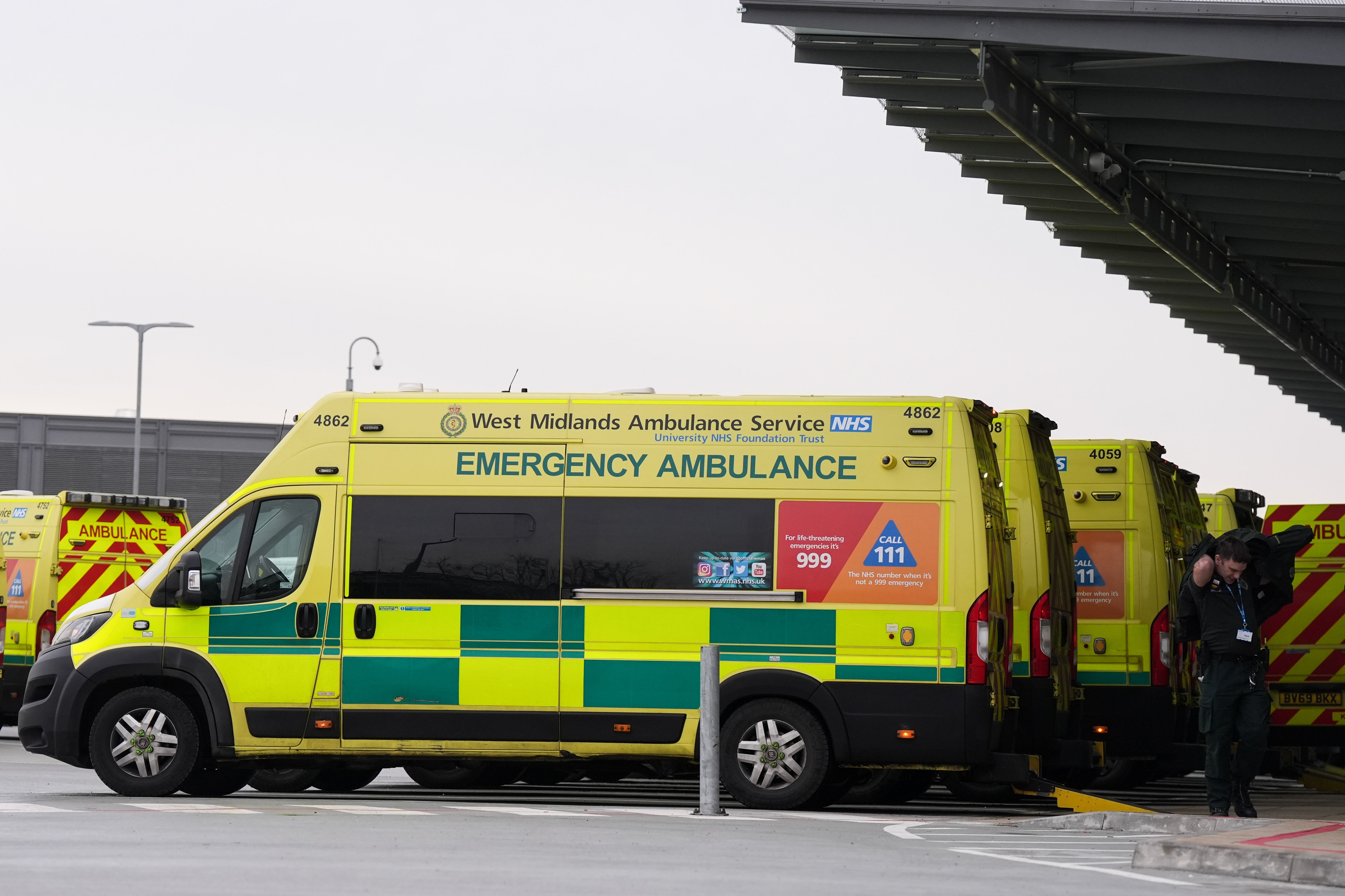 Ambulances wait outside a hospital