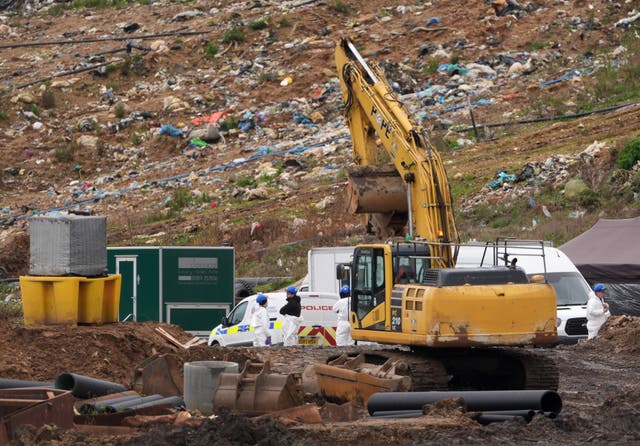 <p>Police officers during the search of a landfill site in Essex (Joe Giddens/PA)</p>