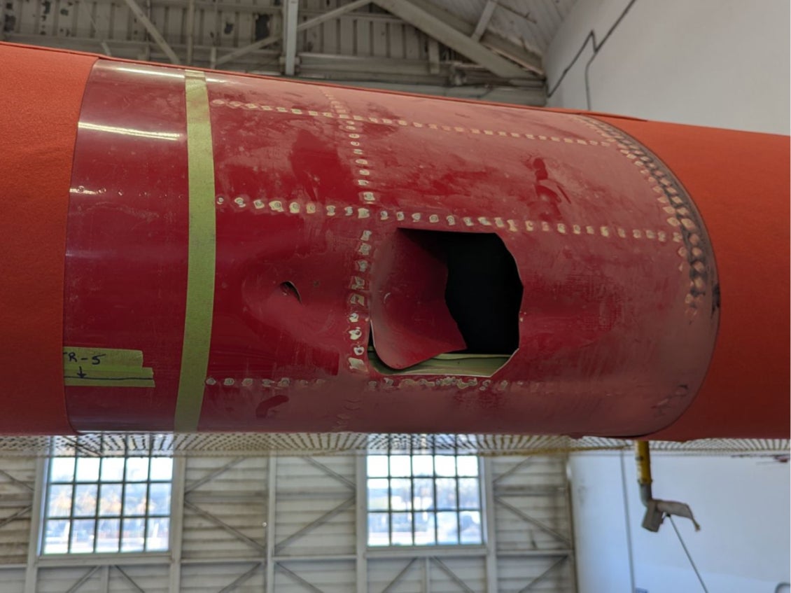 A hole in the wing of a Canadian Super Scooper airplane that was made when the aircraft hit a privately-owned drone operating in restricted airspace near the Los Angeles wildfires