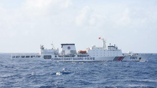 <p>Handout photo from 11 January 2025 shows a Chinese coast guard ship sailing some 60 nautical miles west of the main Philippine island of Luzon</p>