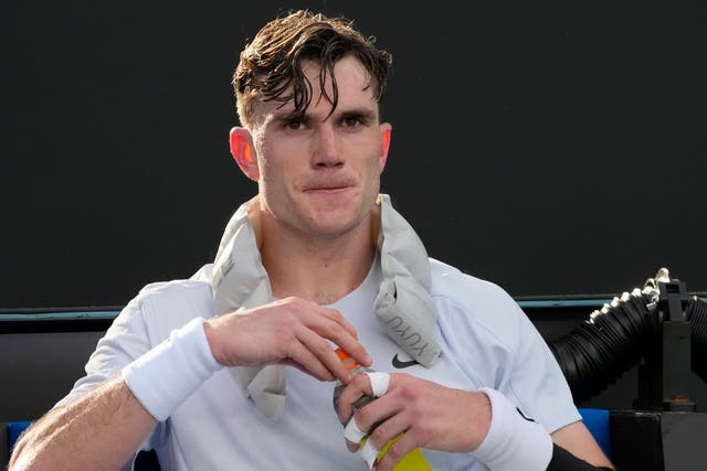 Jack Draper sits with an ice pack during his five-set match against Mariano Navone (Manish Swarup/AP)