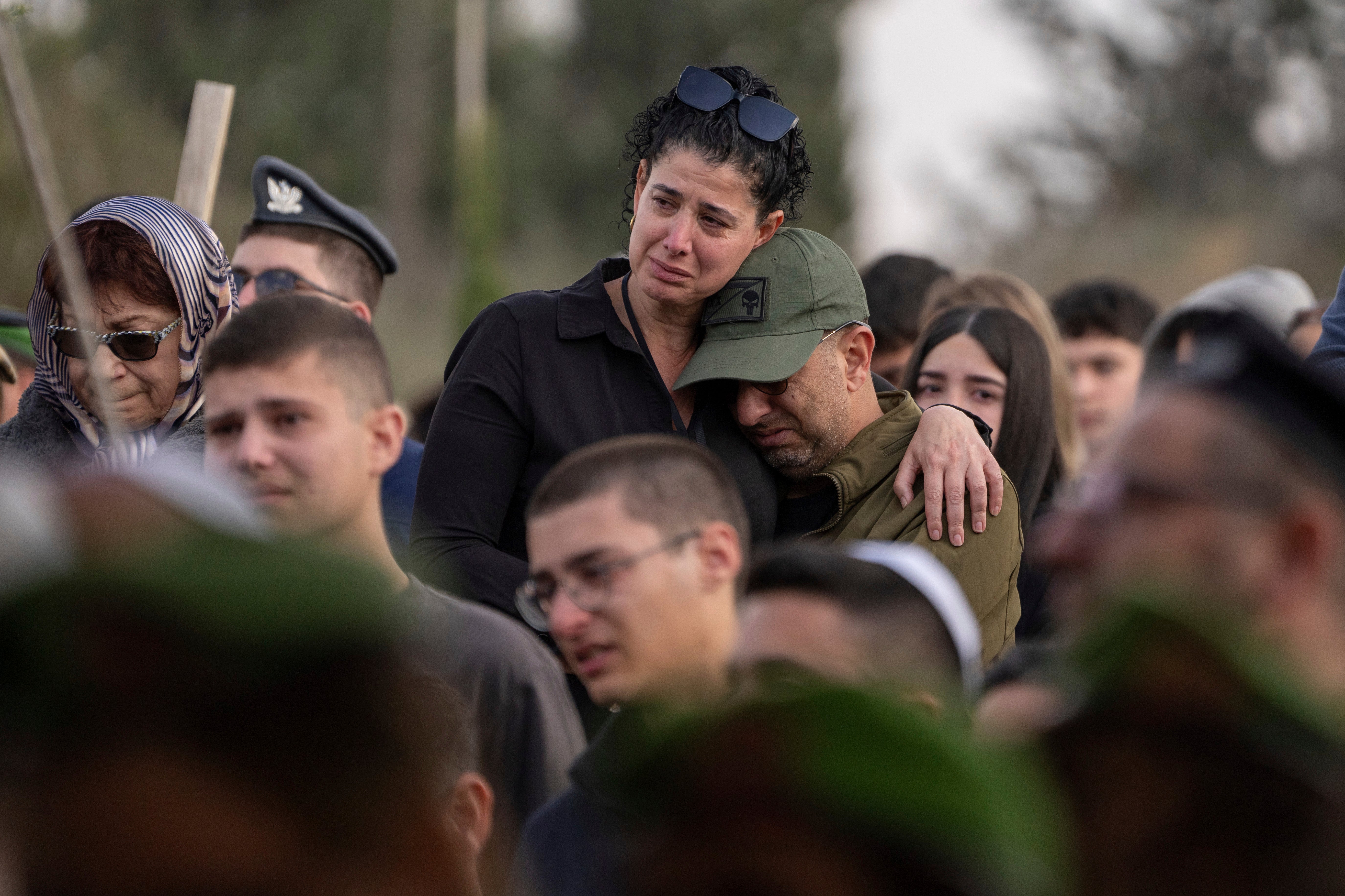 Mourners attend the funeral of Israeli soldier Sergeant Yahav Maayan who was killed in combat in the Gaza Strip