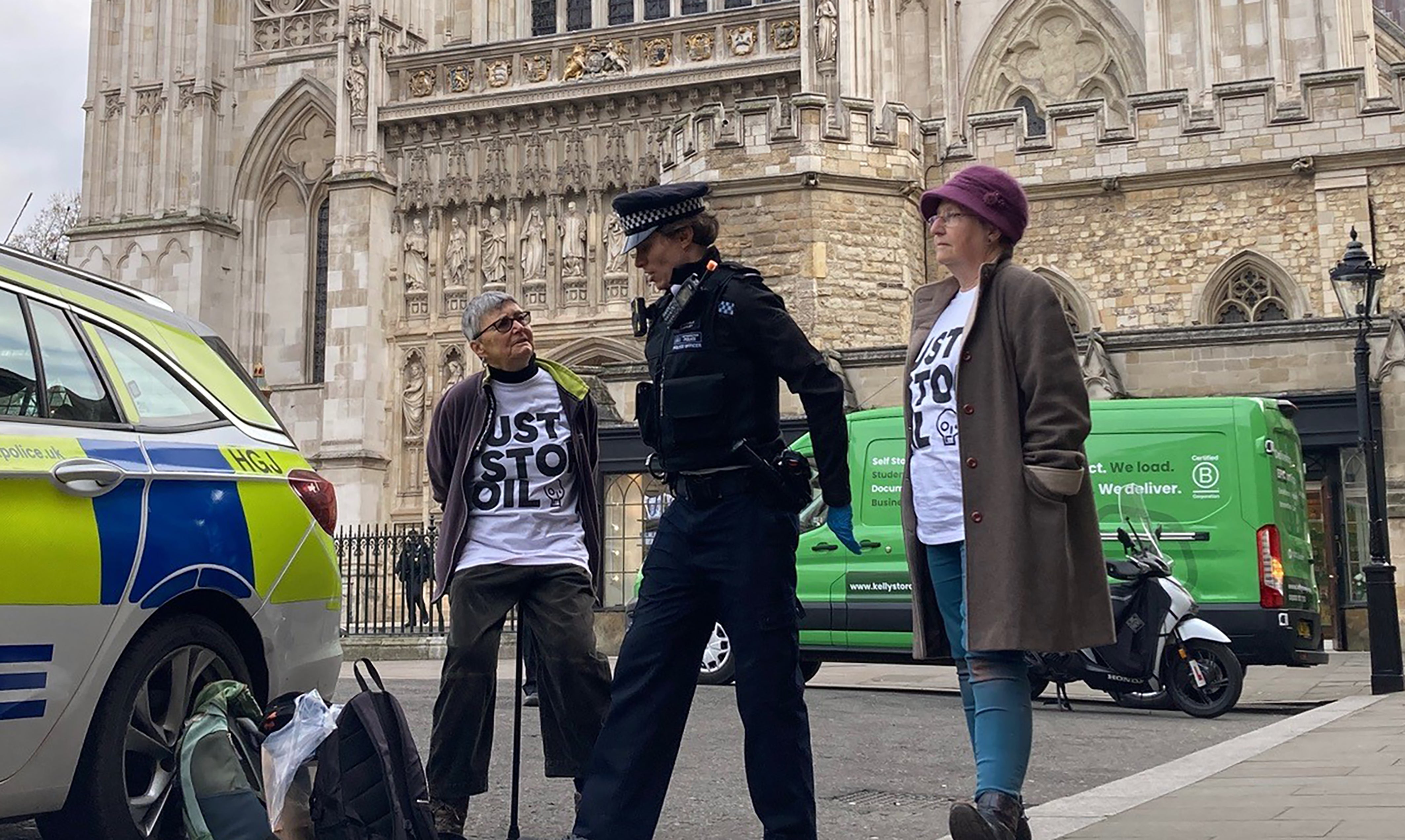 Police led the two protesters away from Westminster Abbey