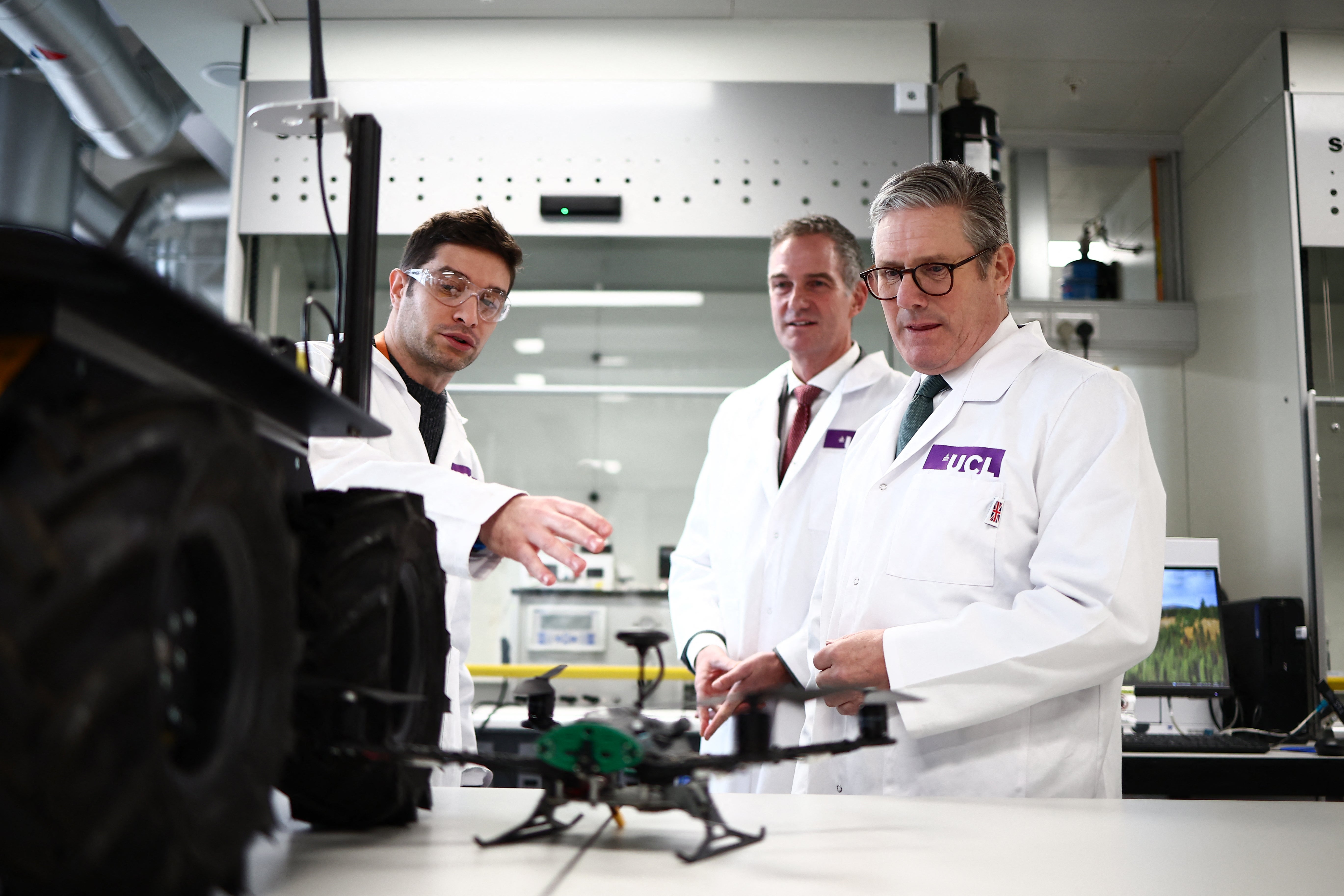 <p>Keir Starmer speaks with researchers and professors during a visit of the Manufacturing Futures Lab at UCL in London</p>