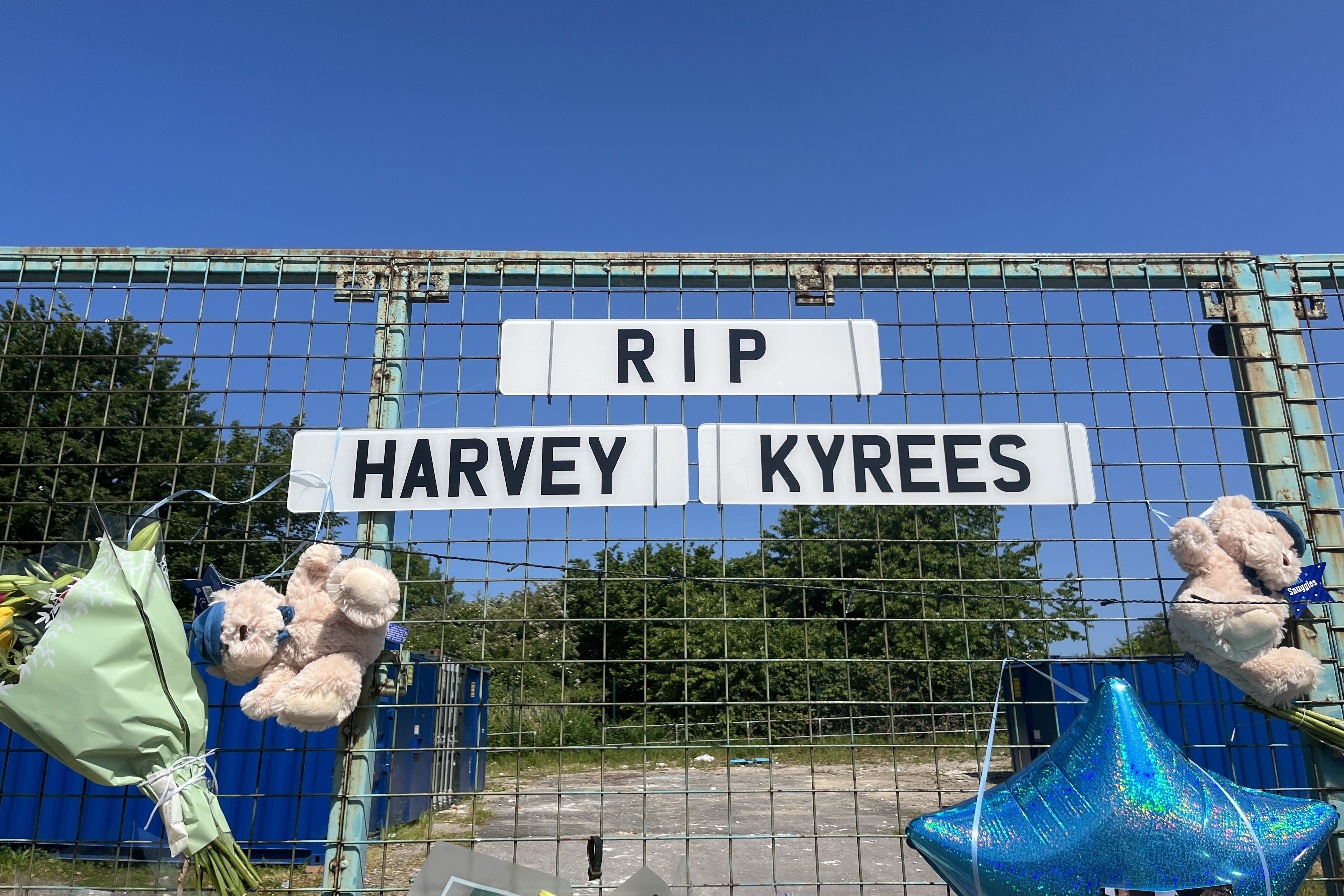 Floral tributes left to Kyrees Sullivan and Harvey Evans in Snowden Road, Ely after their deaths in 2023 (Rod Minchin/PA)