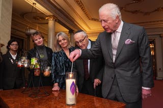 Holocaust memorial day – latest: King begins ‘deeply personal’ Auschwitz visit King Charles III lights a candle during a reception marking Holocaust Memorial Day, when he said that the upcoming visit to Auschwitz-Birkenau as ‘so important’