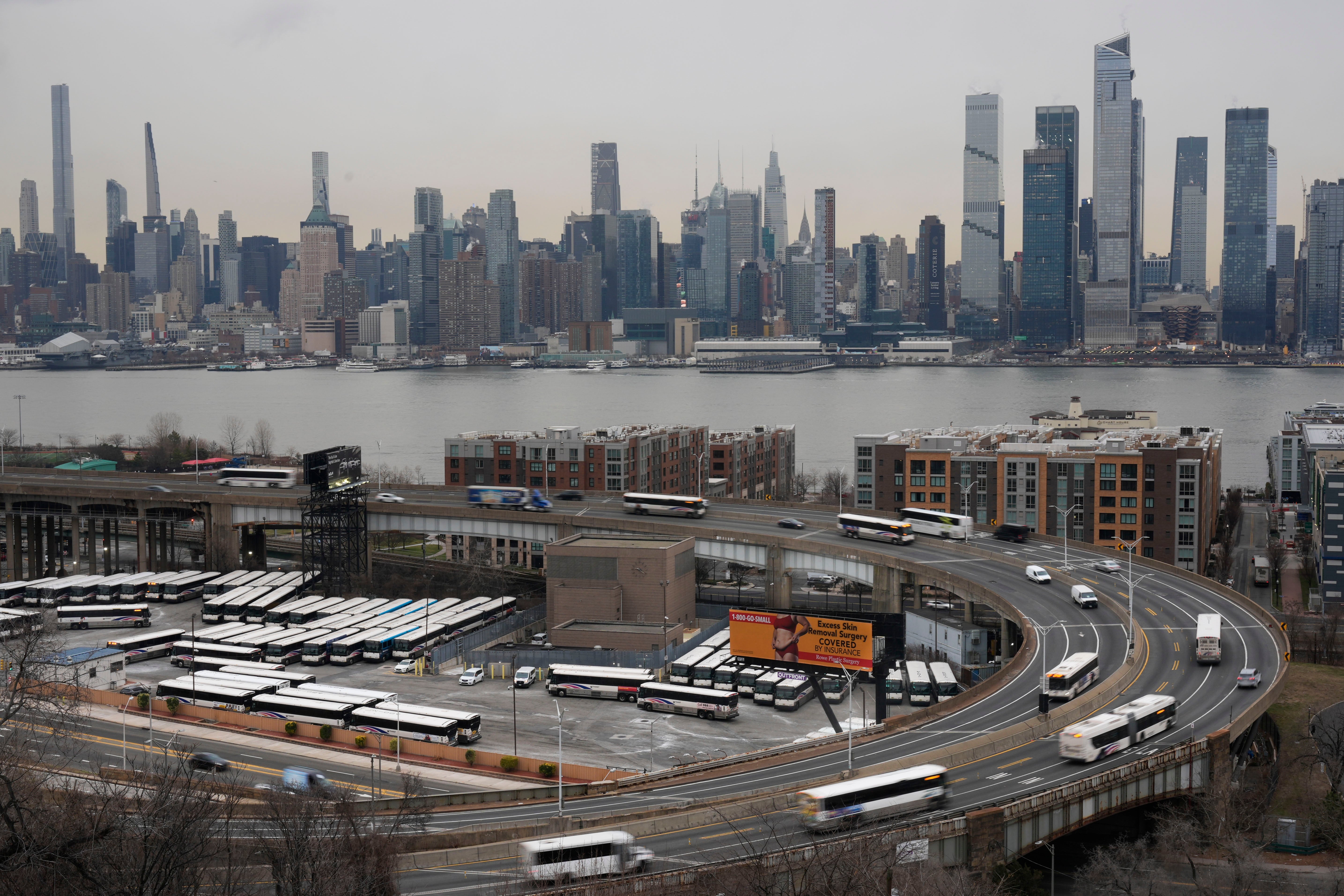 Cars enter and exit midtown Manhattan via the Lincoln Tunnel as seen from Weehawken, N.J., Monday, Jan. 6, 2025. (AP Photo/Seth Wenig)