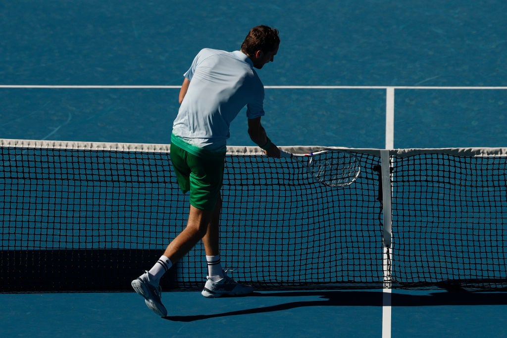 Daniil Medvedev smashes his racket in anger during his five-set win over Kasidit Samrej