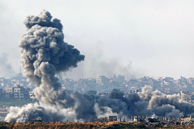 <p>This picture taken from the Israeli side of the border with the Gaza Strip shows smoke plumes rising from explosions above destroyed buildings in the northern Gaza Strip last month amid the ongoing war between Israel and Hamas</p>