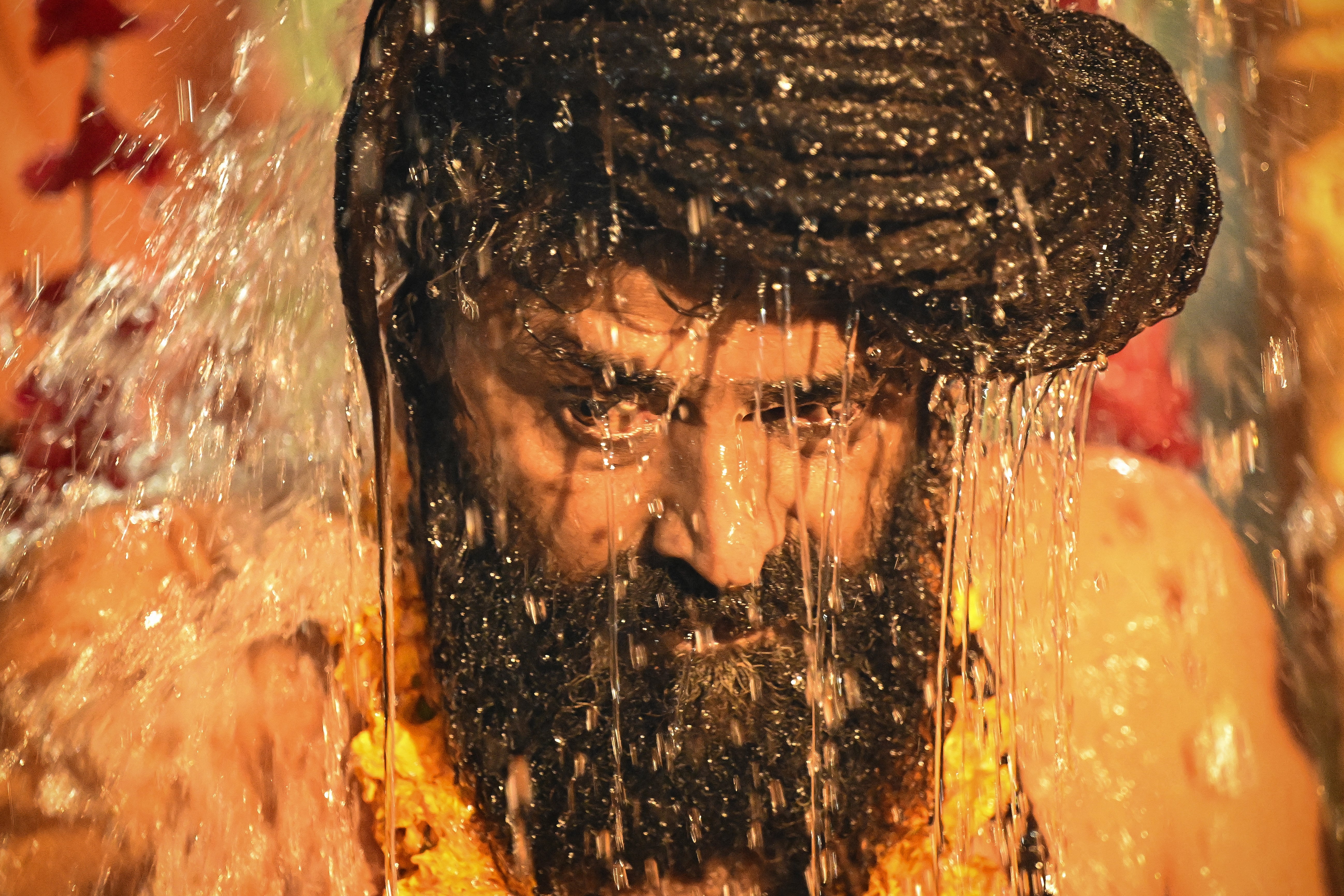 A Hindu ‘holy’ antheral   prepares to instrumentality     a dip successful  the ineffable  waters of Sangam, the confluence of Ganga, Yamuna and mythical Saraswati rivers, during Shahi Snan astatine  the Maha Kumbh Mela successful  Prayagraj connected  14 January 2025