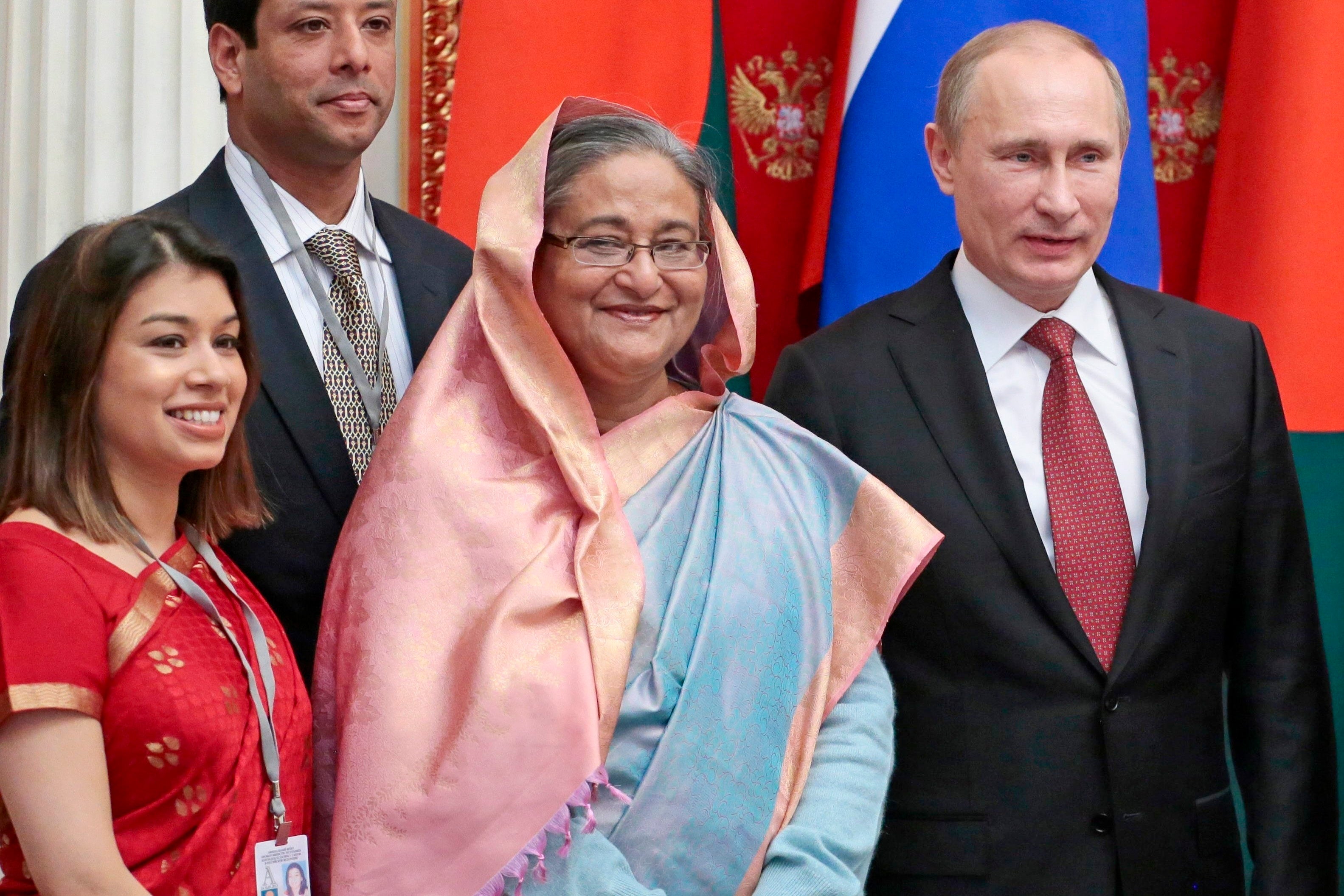 Russian President Vladimir Putin, right, then Bangladesh Prime Minister Sheikh Hasina, second right, and Ms Siddiq