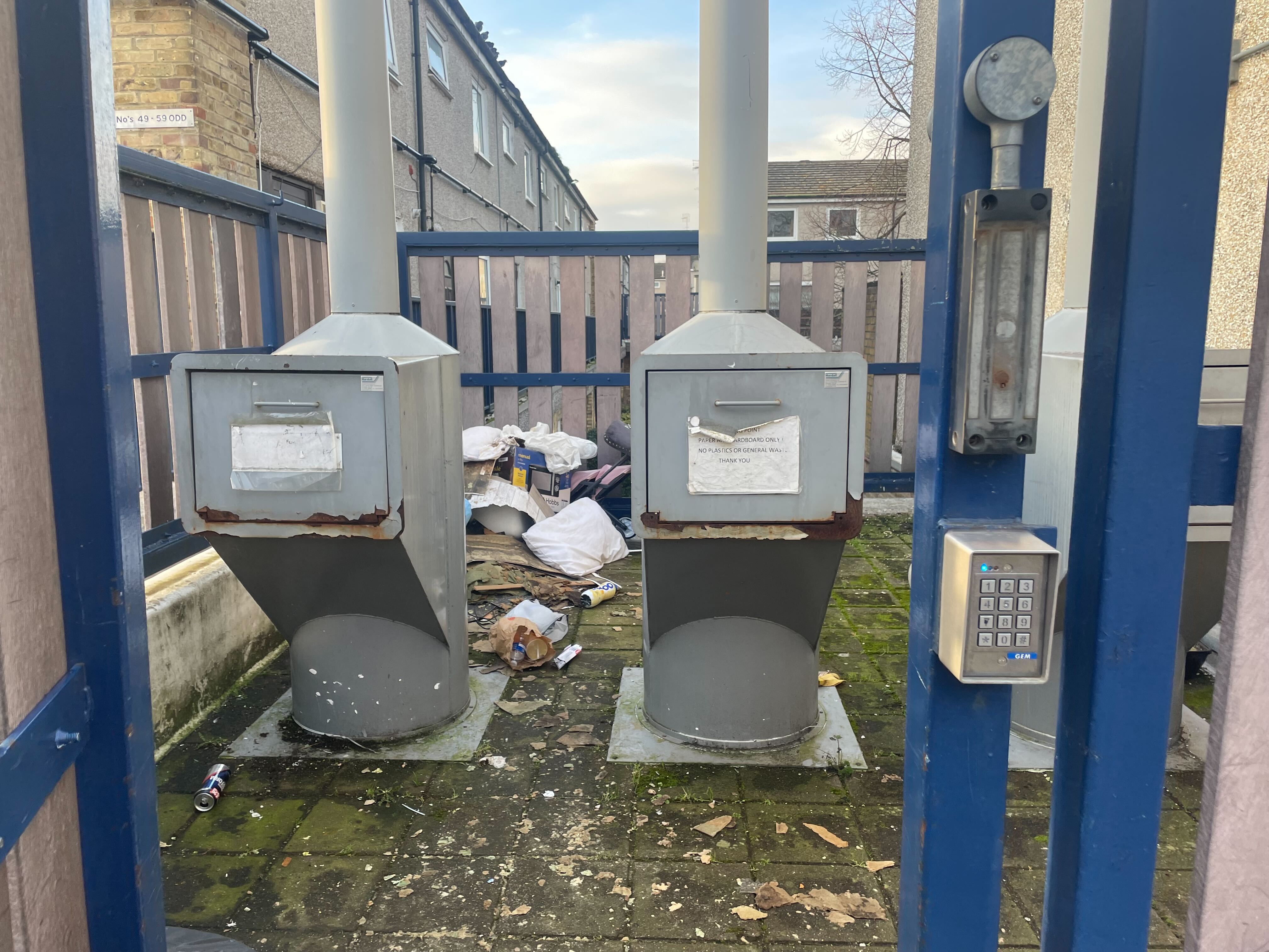 The bin chute where the victim was attacked