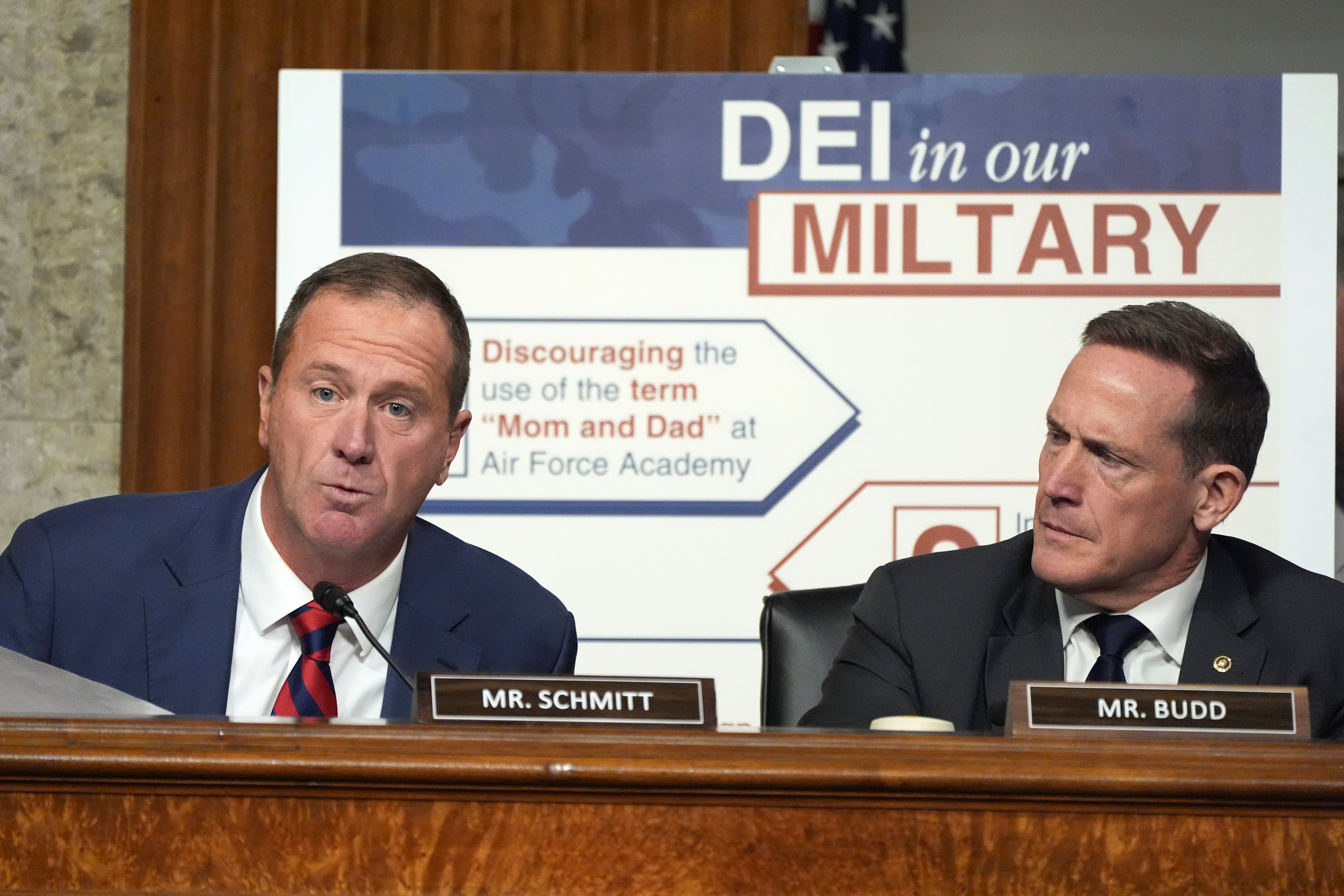 Sen. Eric Schmitt, R-Mo., left, speaks as Sen. Ted Budd, R-N.C., right, listens at the Senate Armed Services Committee confirmation hearing for Pete Hegseth, President-elect Donald Trump’s choice to be Defense secretary, at the Capitol in Washington, Tuesday, Jan. 14, 2025