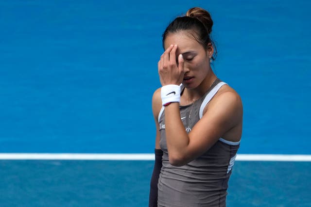 Zheng Qinwen looks dejected during her loss to Laura Siegemund (Asanka Brendon Ratnayake/AP)