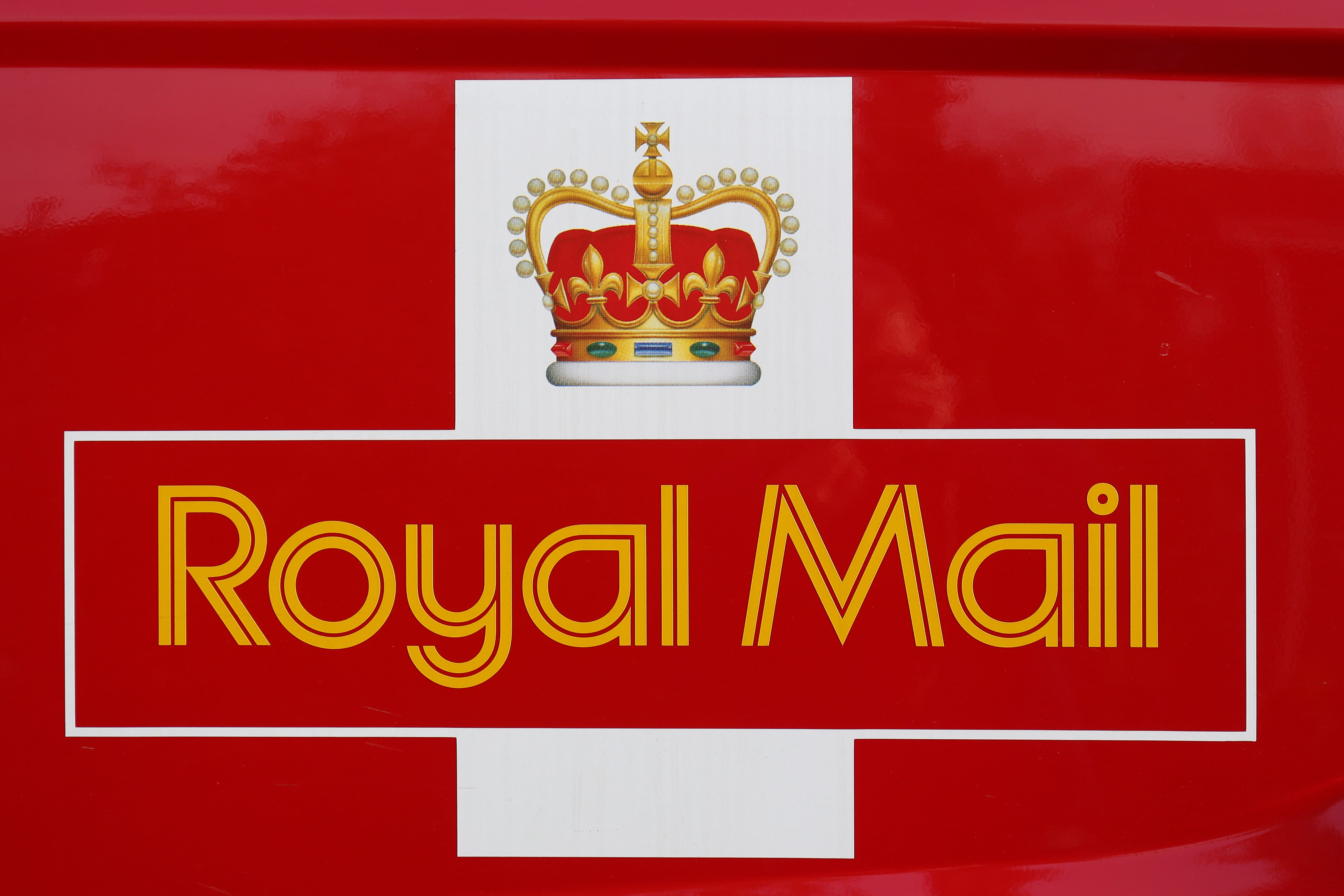The owner of Royal Mail said it remains on track to return to annual profit after a parcel boost over Christmas as its £3.6 billion takeover by Czech billionaire Daniel Kretinsky nears completion.