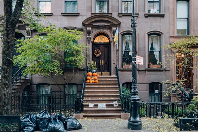 <p>66 Perry Street became famous as Carrie Bradshaw’s apartment on Sex and the City. But too many fans visiting has left the owner frustrated </p>