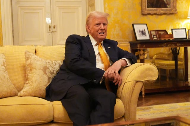 <p>Sitting pretty: Donald Trump in the UK Ambassador's residence in Paris</p>