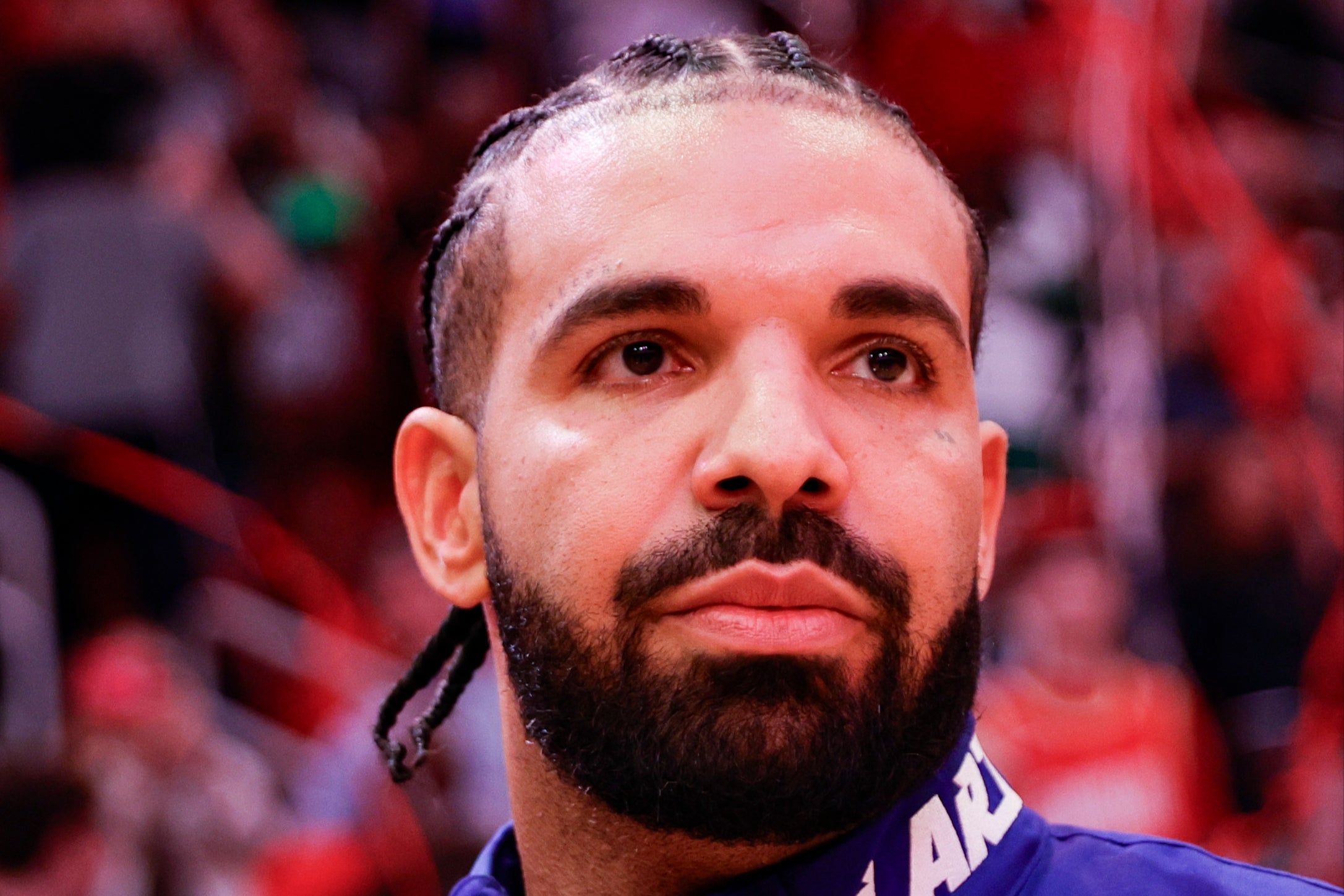 Drake attending an NBA game between the Houston Rockets and the Cleveland Cavaliers on March 16, 2024