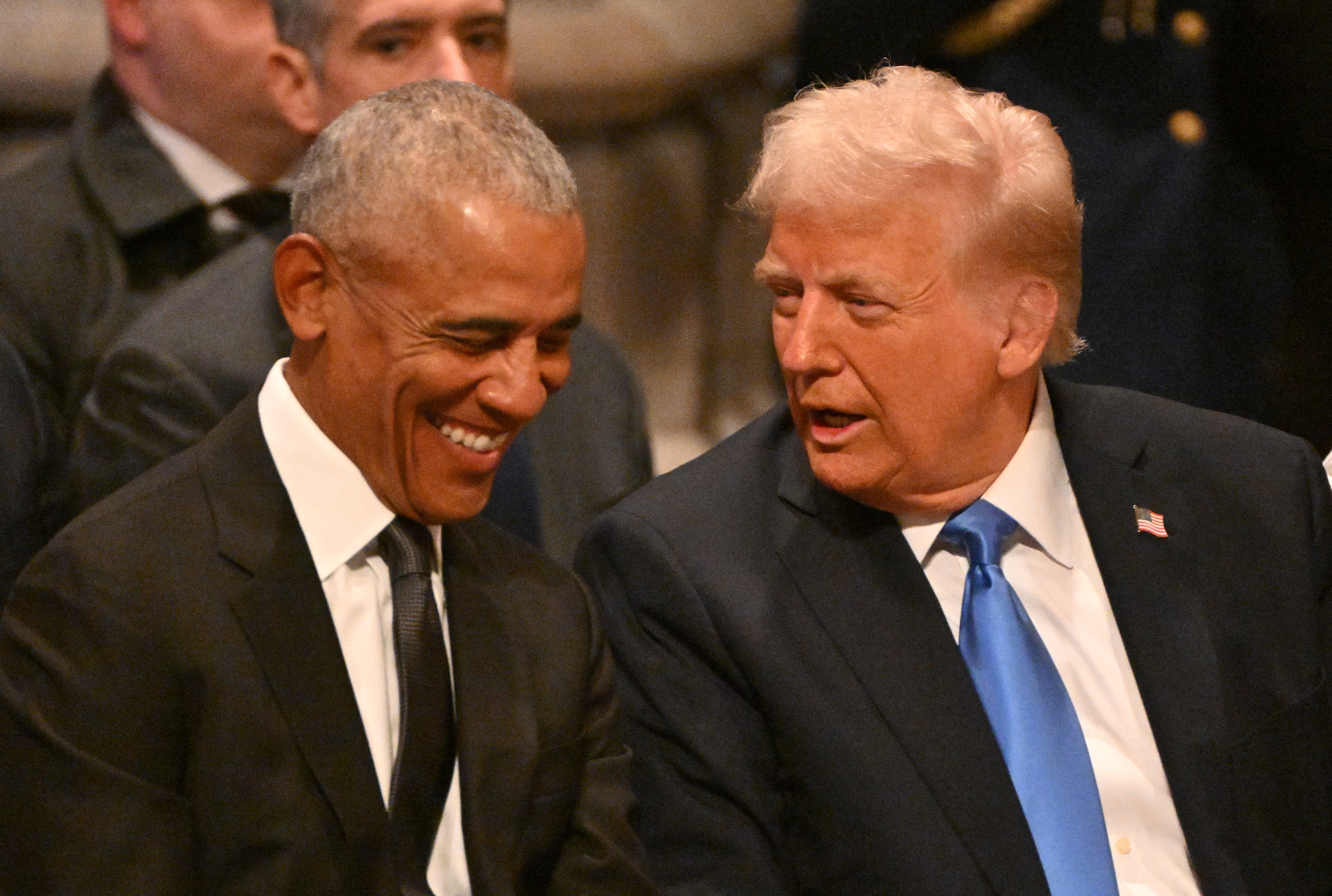 Barack Obama e Donald Trump pareciam se dar bem no funeral de Jimmy Carter, que Michelle Obama também faltou