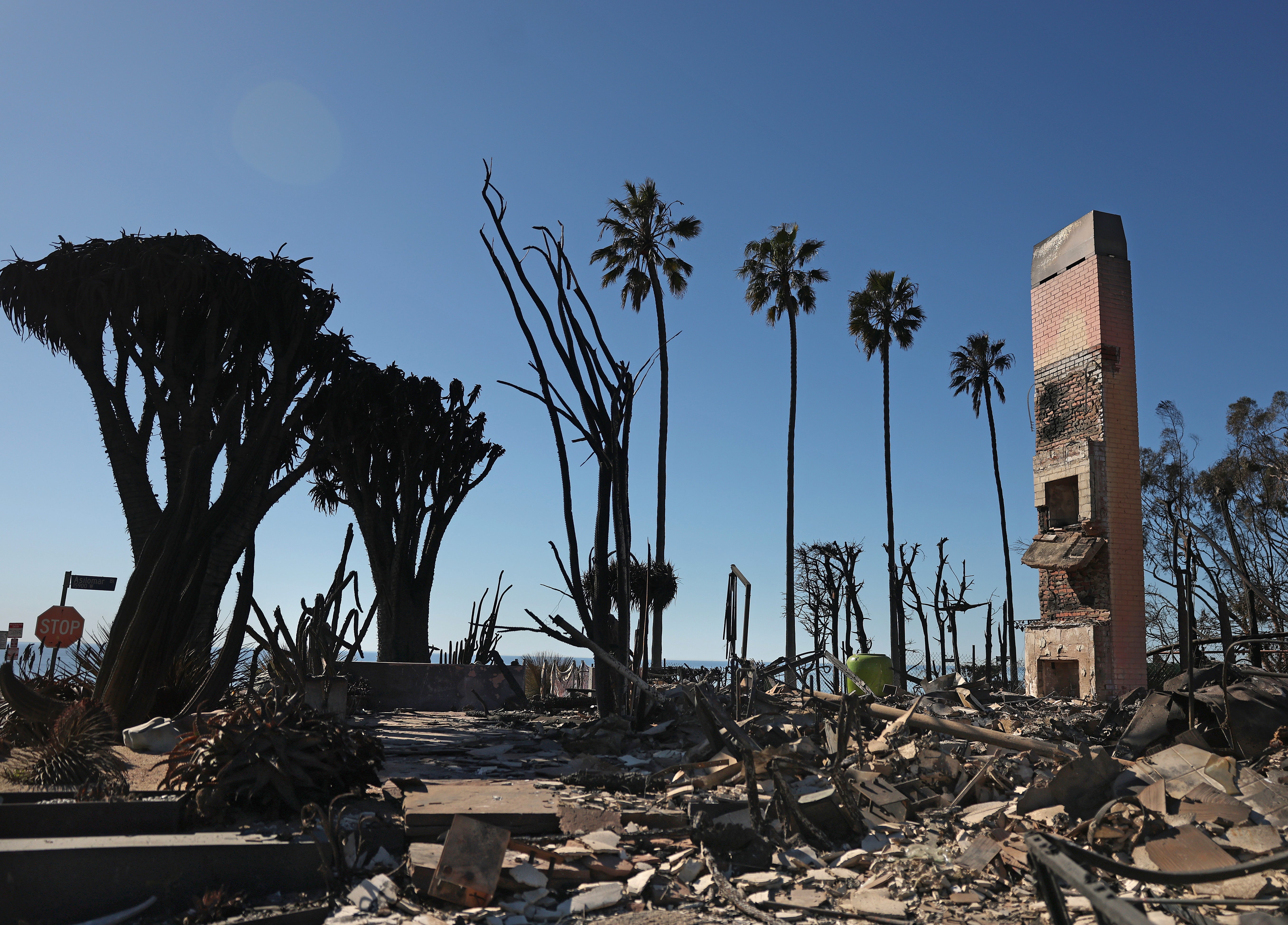 A chimney remains at the site of a home that was destroyed by the Palisades fire on January 14 in Pacific Palisades, California