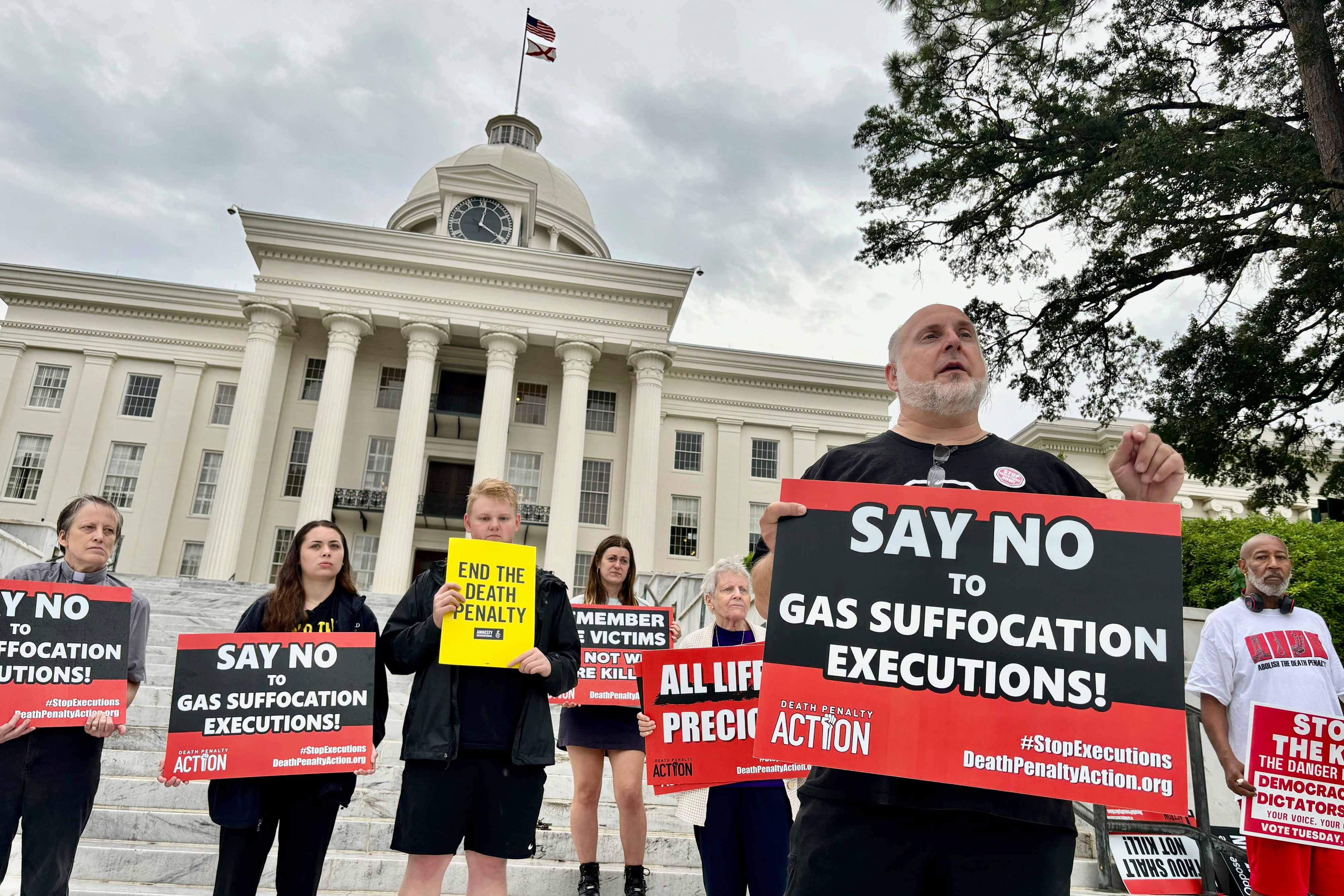 Abraham Bonowitz, executive director of Death Penalty Action, and other death penalty opponents hold a demonstration outside the Alabama Capitol in September