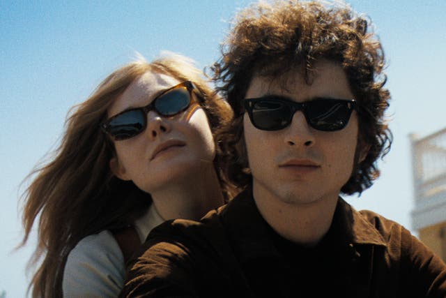 <p>Elle Fanning and Timothée Chalamet in ‘A Complete Unknown’</p>
