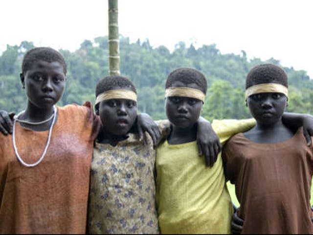 <p>Jarawa girls in clothes given to them by outsiders. Encroachment onto their land risks exposing the Jarawa to diseases to which they have no immunity, warn experts </p>