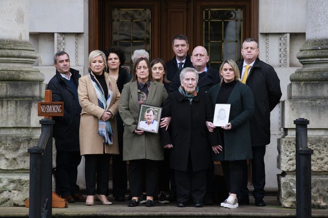 The family of murdered GAA official Sean Brown with supporters (PA)