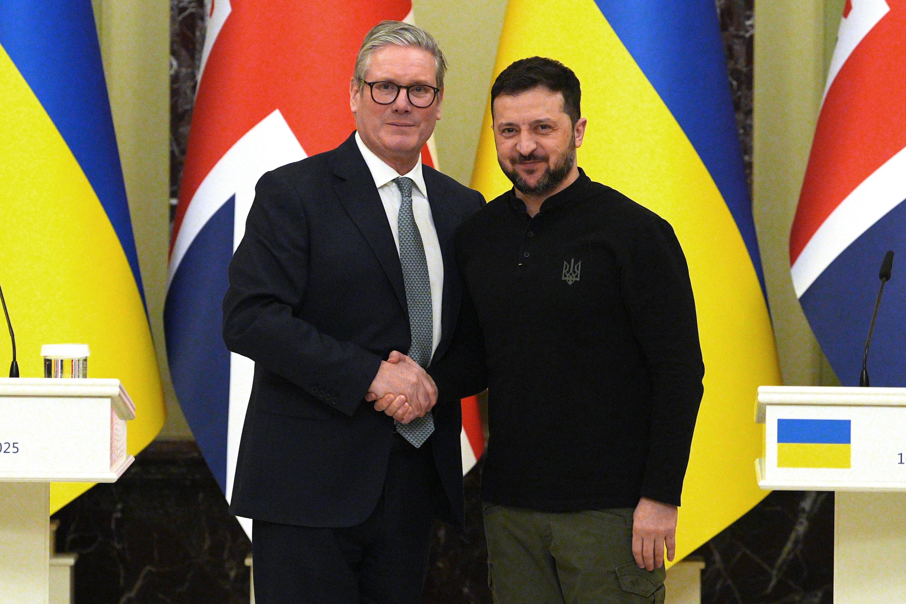 Prime Minister Sir Keir Starmer and Ukrainian President Volodymyr Zelensky shake hands at the start of a press conference during his visit to Ukraine (Carl Court/PA)