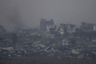 Buildings destroyed by Israeli bombing seen inside the Gaza Strip from southern Israel