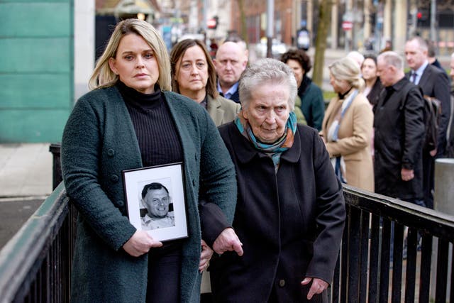 The family of murdered GAA official Sean Brown, daughter Clare Loughran (left) and widow Bridie Brown (right) arriving at Belfast High Court (Liam McBurney/PA)