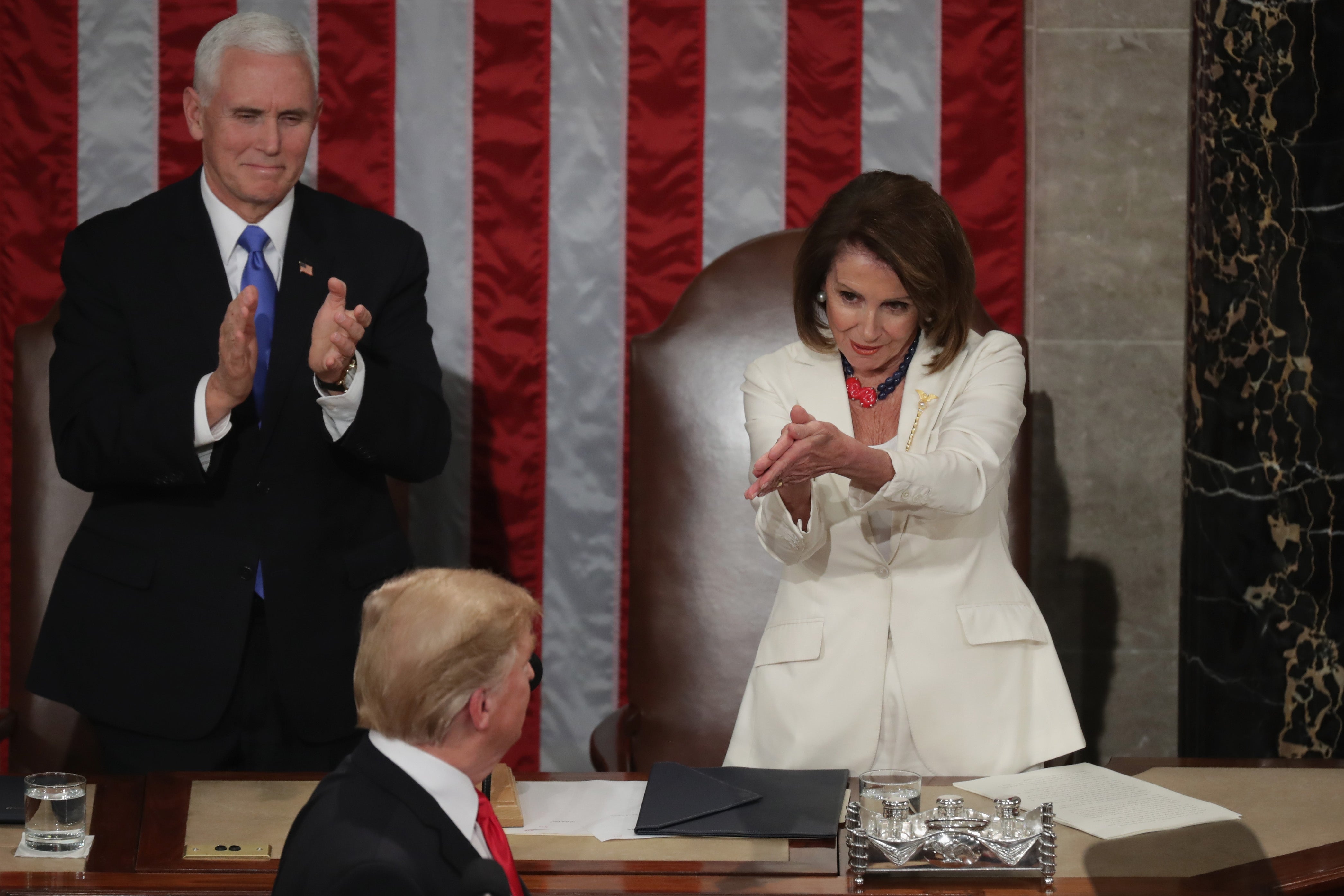 <p>Speaker Nancy Pelosi and Vice President Mike Pence applaud President Donald Trump at the State of the Union address in the chamber of the U.S. House of Representatives at the U.S. Capitol Building on February 5, 2019 in Washington, DC</p>