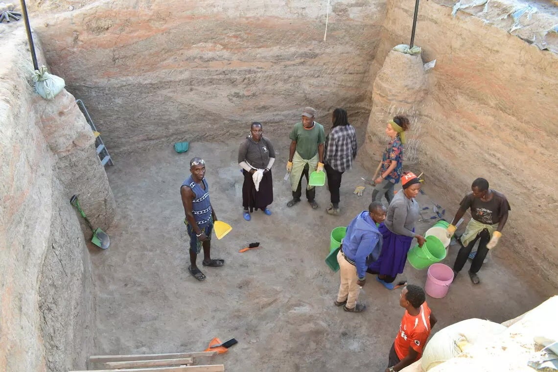 Masai landowners and project members collaborate at excavations of the site of Engaji Nanyori in Tanzania’s Olduvai Gorge. After conducting research at the site, a group of international researchers have found early humans adapted to desert-like conditions earlier than previously thought