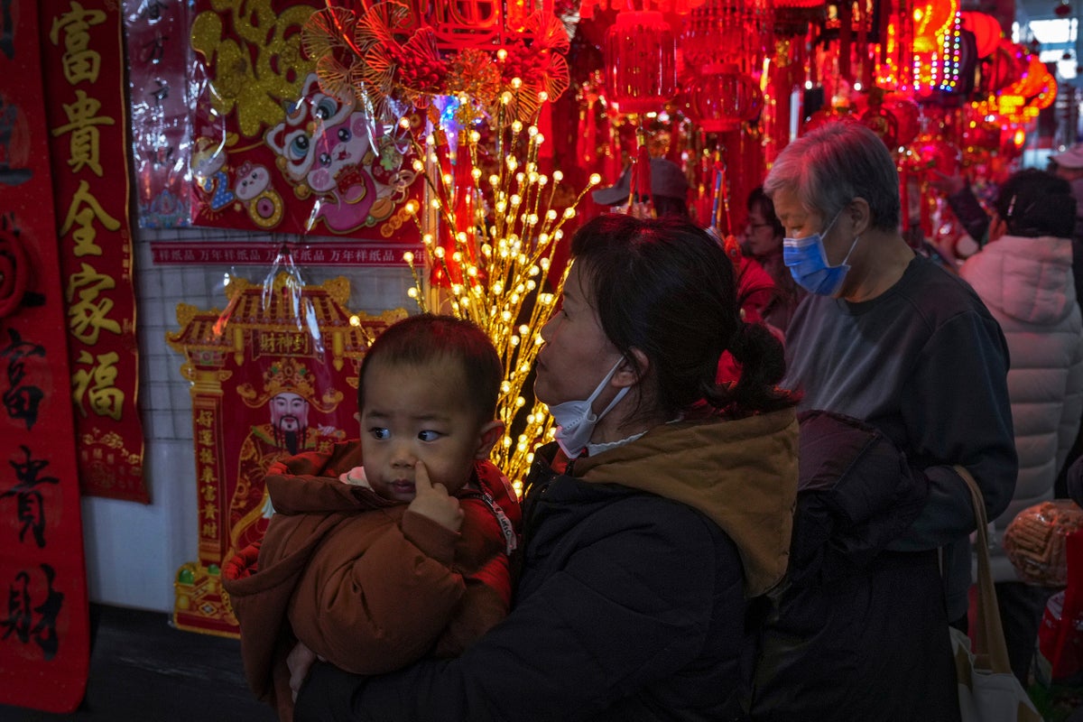 China's population falls for a third straight year, posing challenges for its government and economy