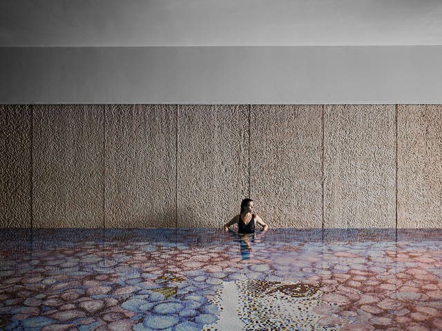 <p>The indoor pool at L’Albereta in northern Italy’s Lombardy region is covered in 600,000 bisazza mosaic tiles</p>