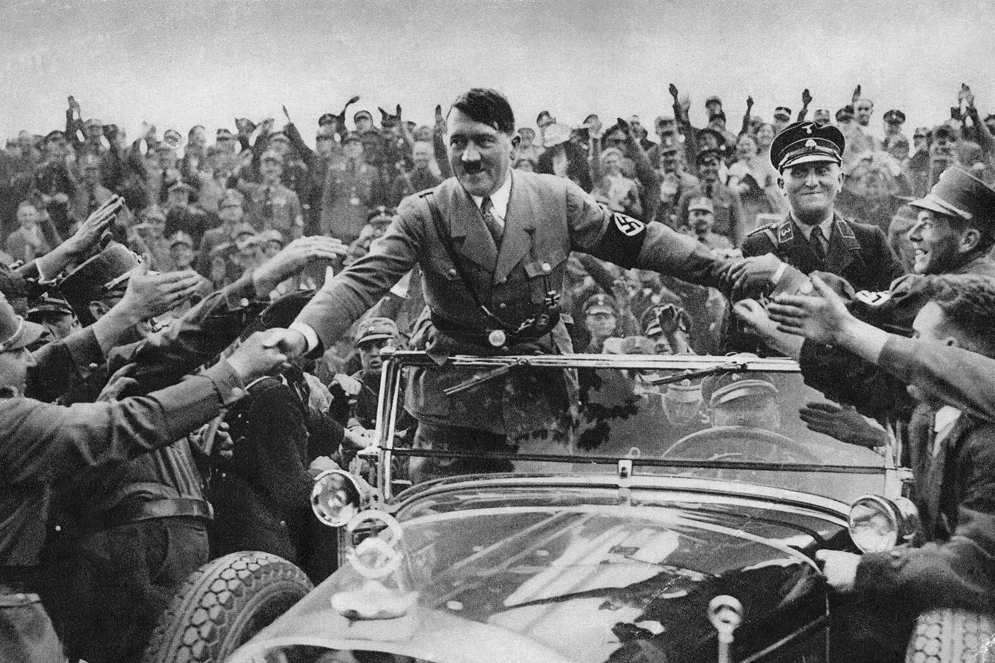 Hitler, then chancellor of Germany, is welcomed by supporters at Nuremberg in 1933