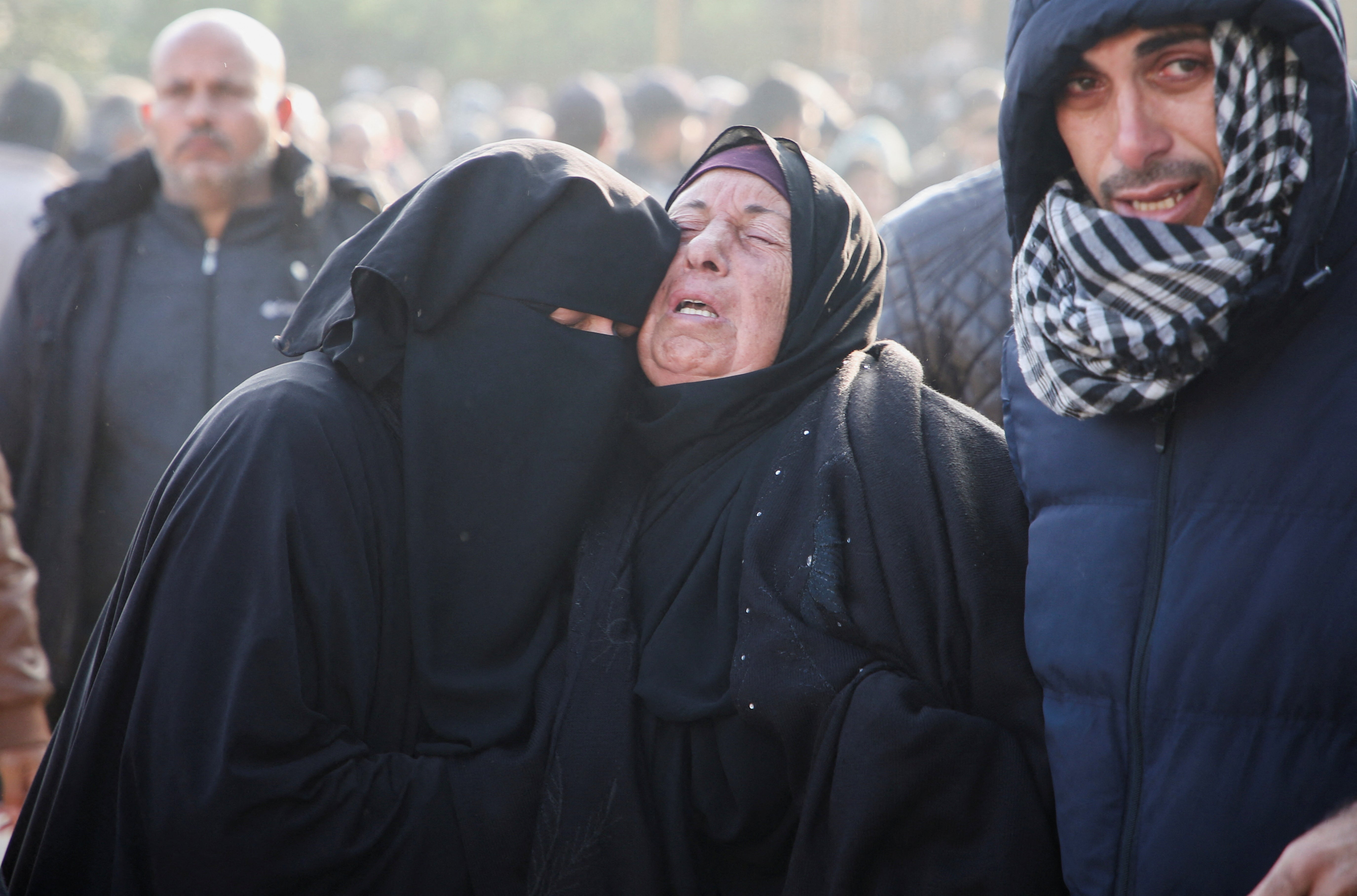 Mourners react to Palestinians killed in Israeli airstrikes