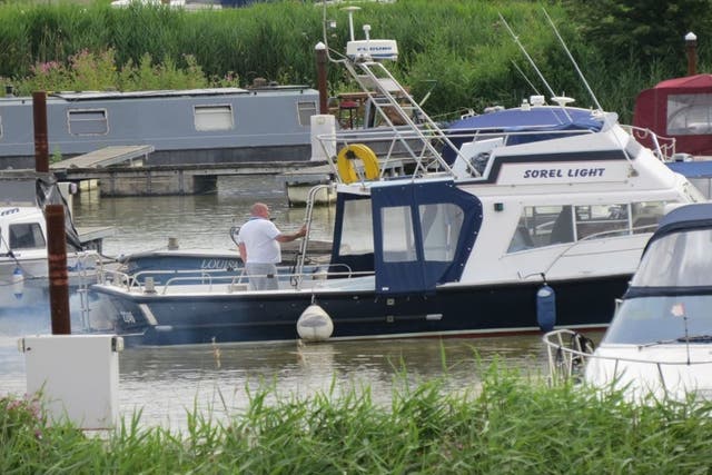 Freddy Lawrence and Keith Baigent on the vessel Sorel Light (NCA/PA)