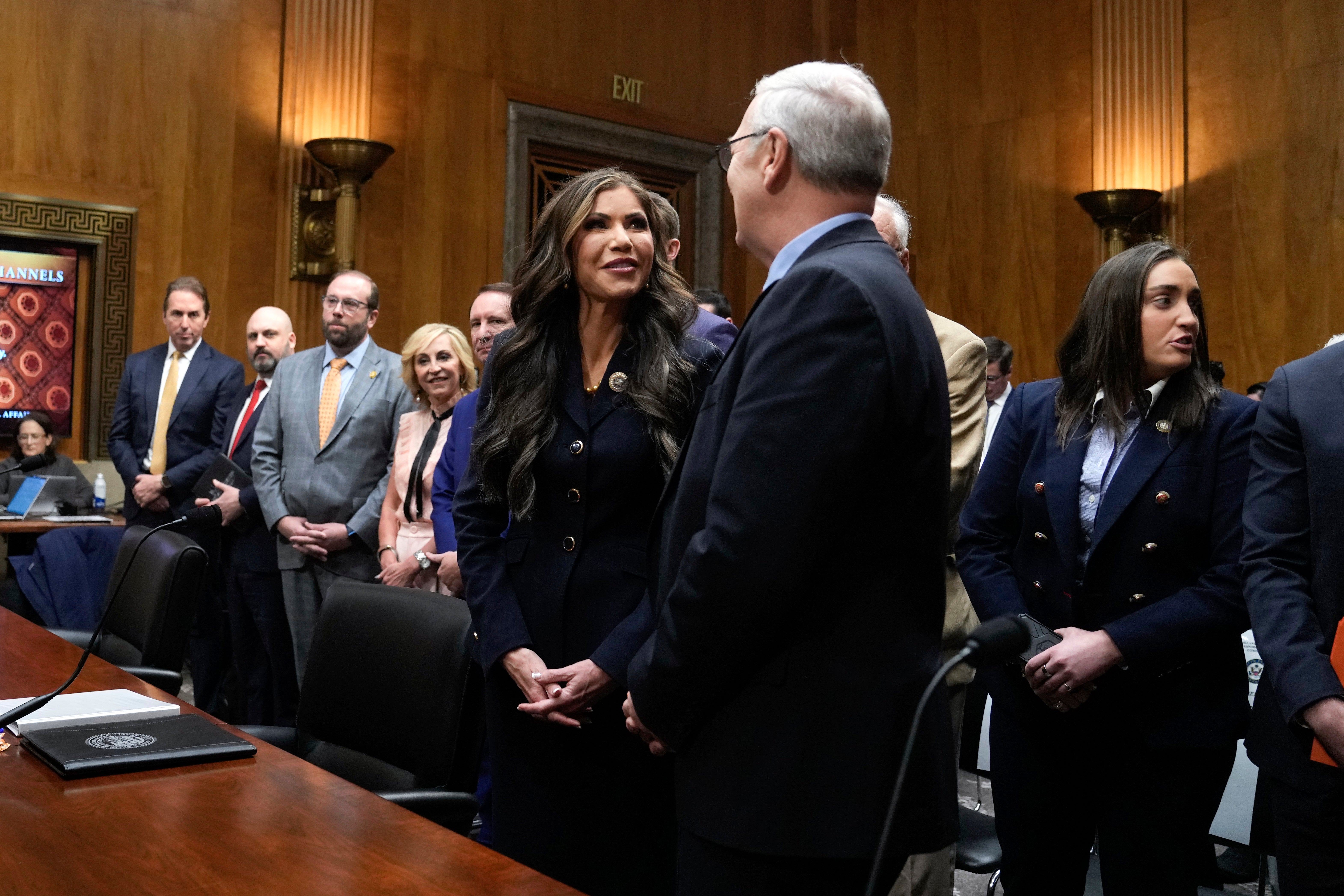 Noem is greeted by Republican Senator John Cramer