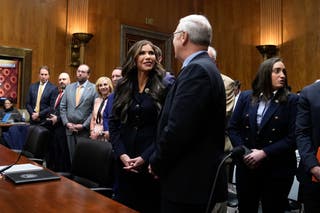 Noem is greeted by Republican Senator John Cramer