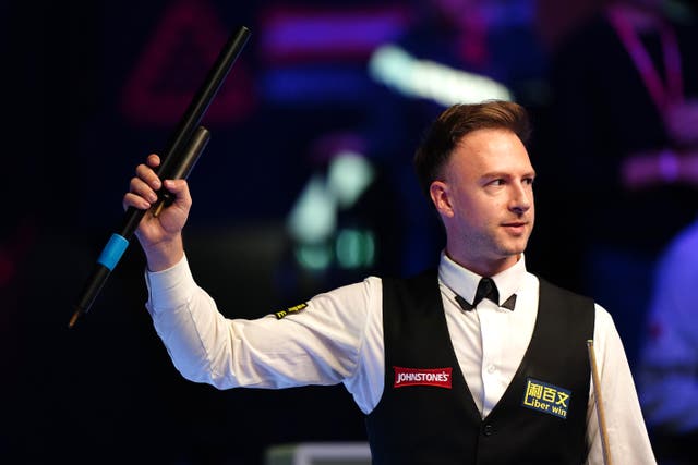 <p>Judd Trump salutes the crowd after beating Ding Junhui in the quarter-finals</p>