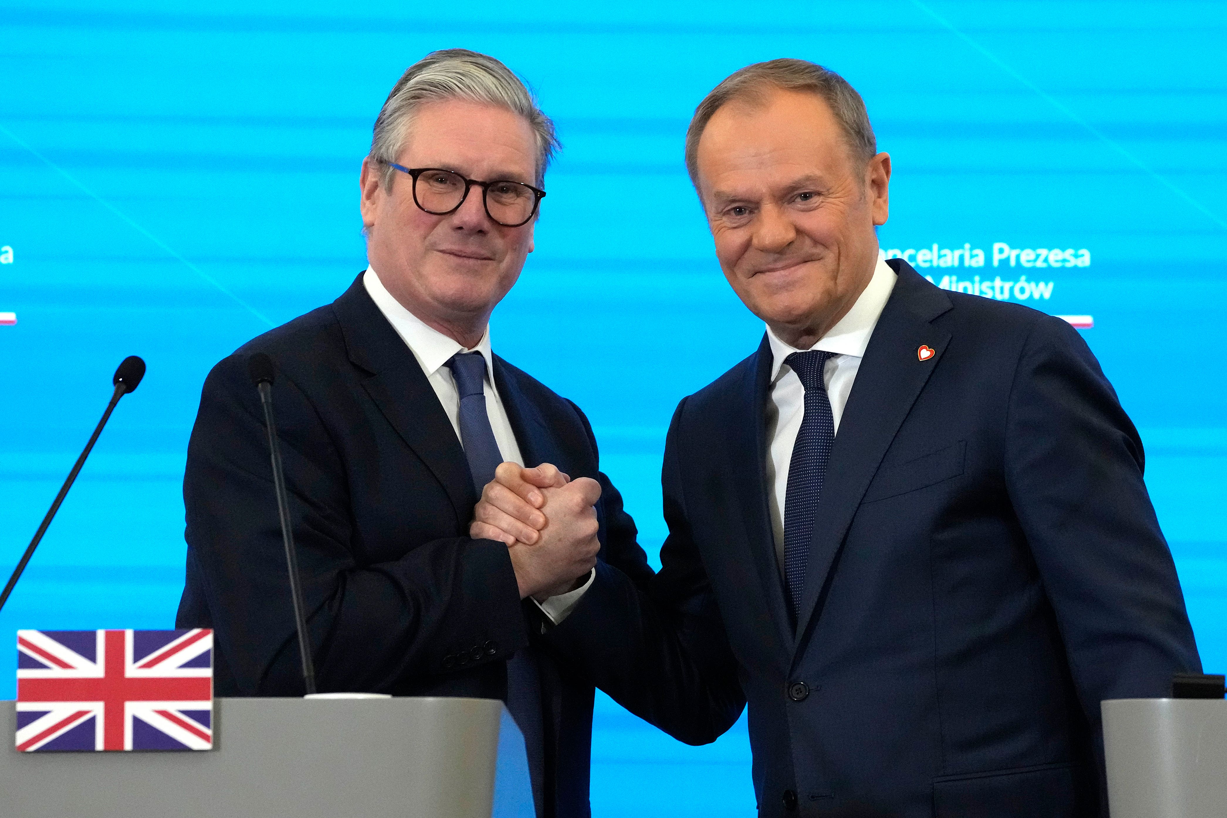 Sir Keir and Mr Tusk shake hands following the press conference